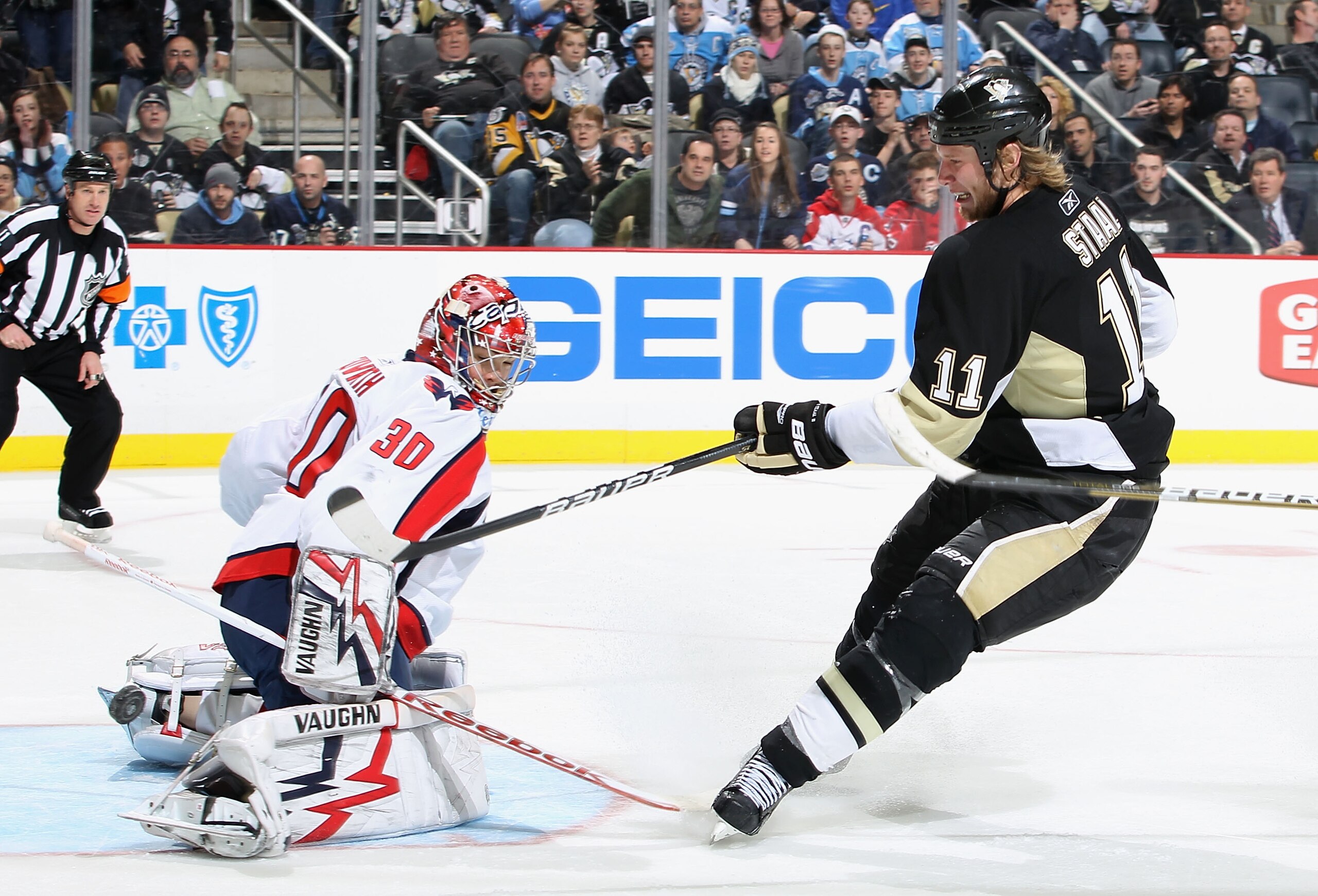 PITTSBURGH, PA - FEBRUARY 21:  Jordan Staal #11 of the Pittsburgh Penguins has his short handed shot saved by goaltender Michal Neuvirth #30 of the Washington Capitals during the second period of the NHL game at Consol Energy Center on February 21, 2011 i