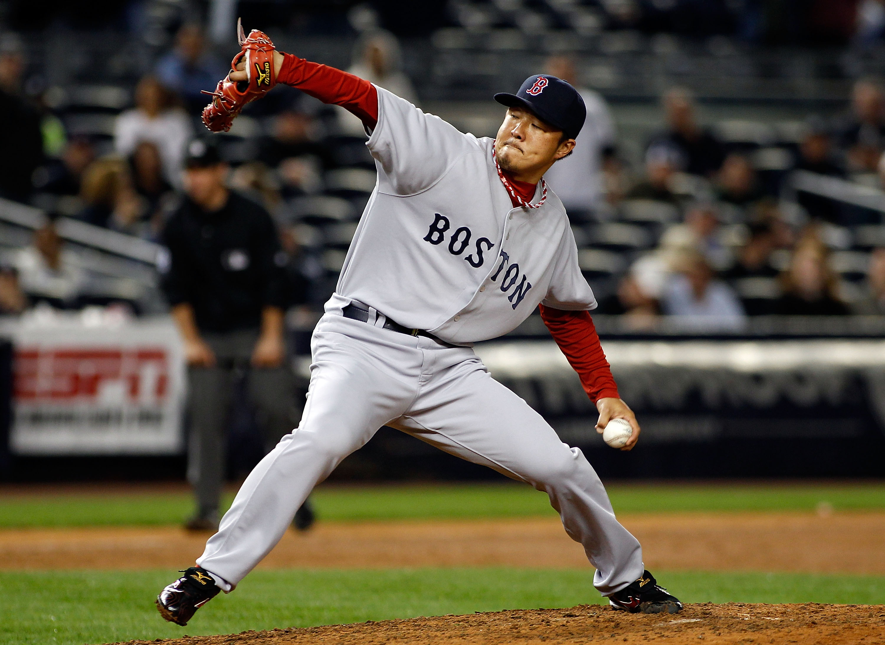 NEW YORK - SEPTEMBER 26: Hideki Okajima #37of the Boston Red Sox delivers a pitch against the New York Yankees on September 26, 2010 at Yankee Stadium in the Bronx borough of New York City. The Yankees won 4-3.  (Photo by Mike Stobe/Getty Images)