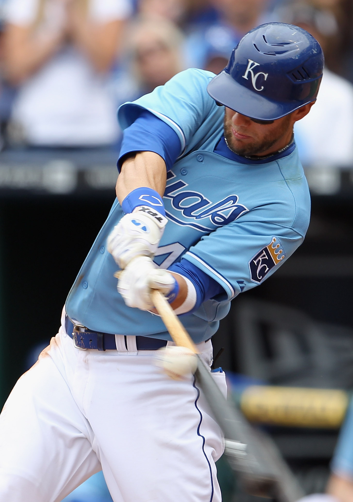 KANSAS CITY, MO - APRIL 17:  Alex Gordon #4 of the Kansas City Royals connects during the game against the Seattle Mariners on April 17, 2011 at Kauffman Stadium in Kansas City, Missouri.  (Photo by Jamie Squire/Getty Images)