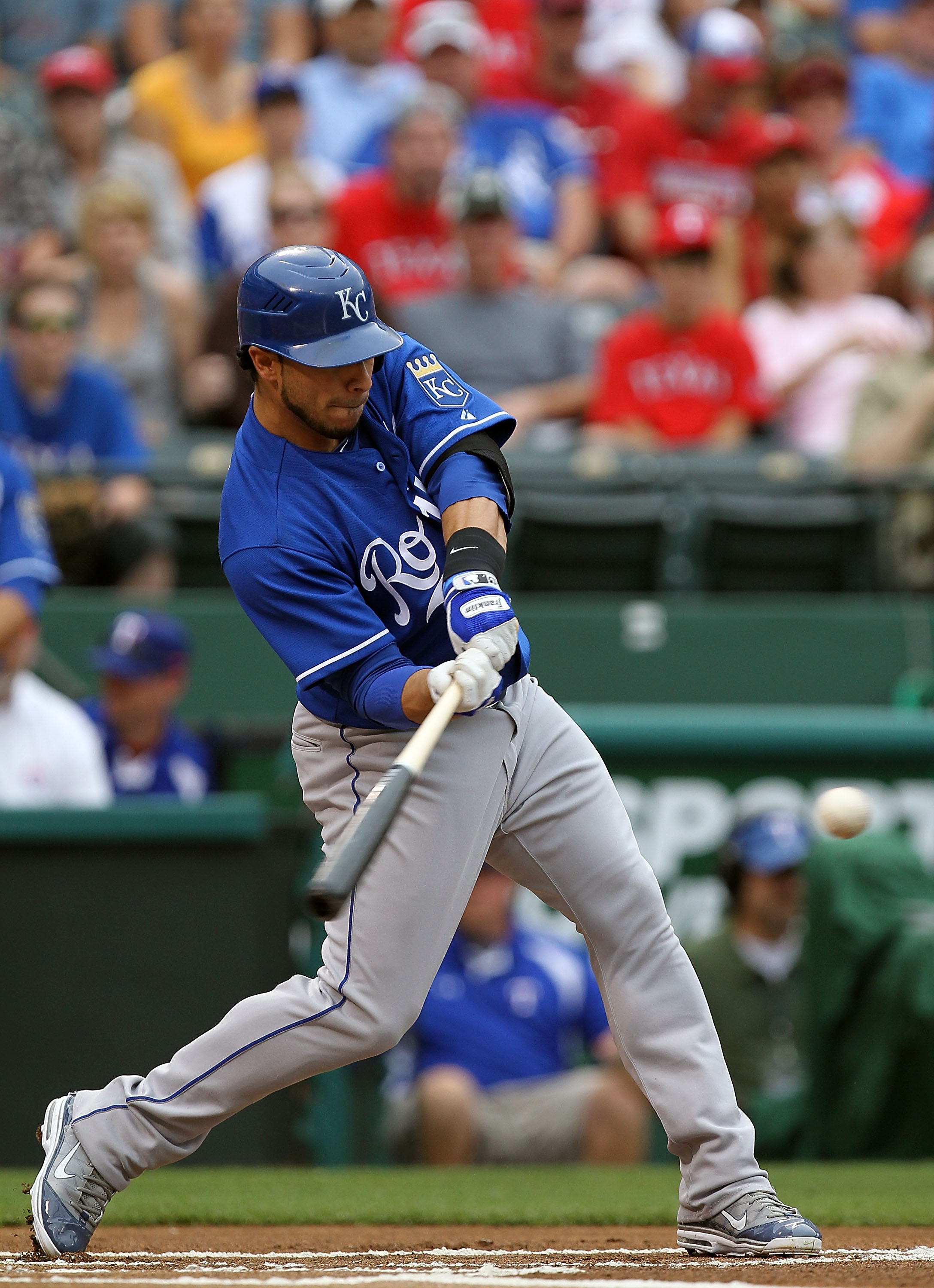 ARLINGTON, TX - APRIL 24:  Mike Aviles #13 of the Kansas City Royals hits a single against the Texas Rangers at Rangers Ballpark in Arlington on April 24, 2011 in Arlington, Texas.  (Photo by Ronald Martinez/Getty Images)