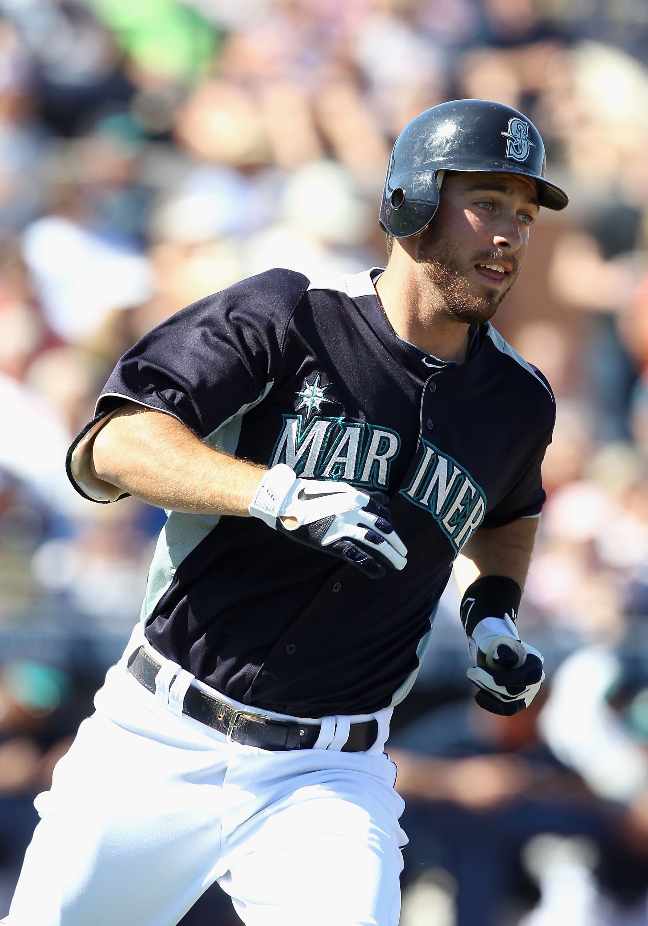 PEORIA, AZ - MARCH 04:  Dustin Ackley #13 of the Seattle Mariners runs to first base during the spring training game against the Cincinnati Reds at Peoria Stadium on March 4, 2011 in Peoria, Arizona.  (Photo by Christian Petersen/Getty Images)
