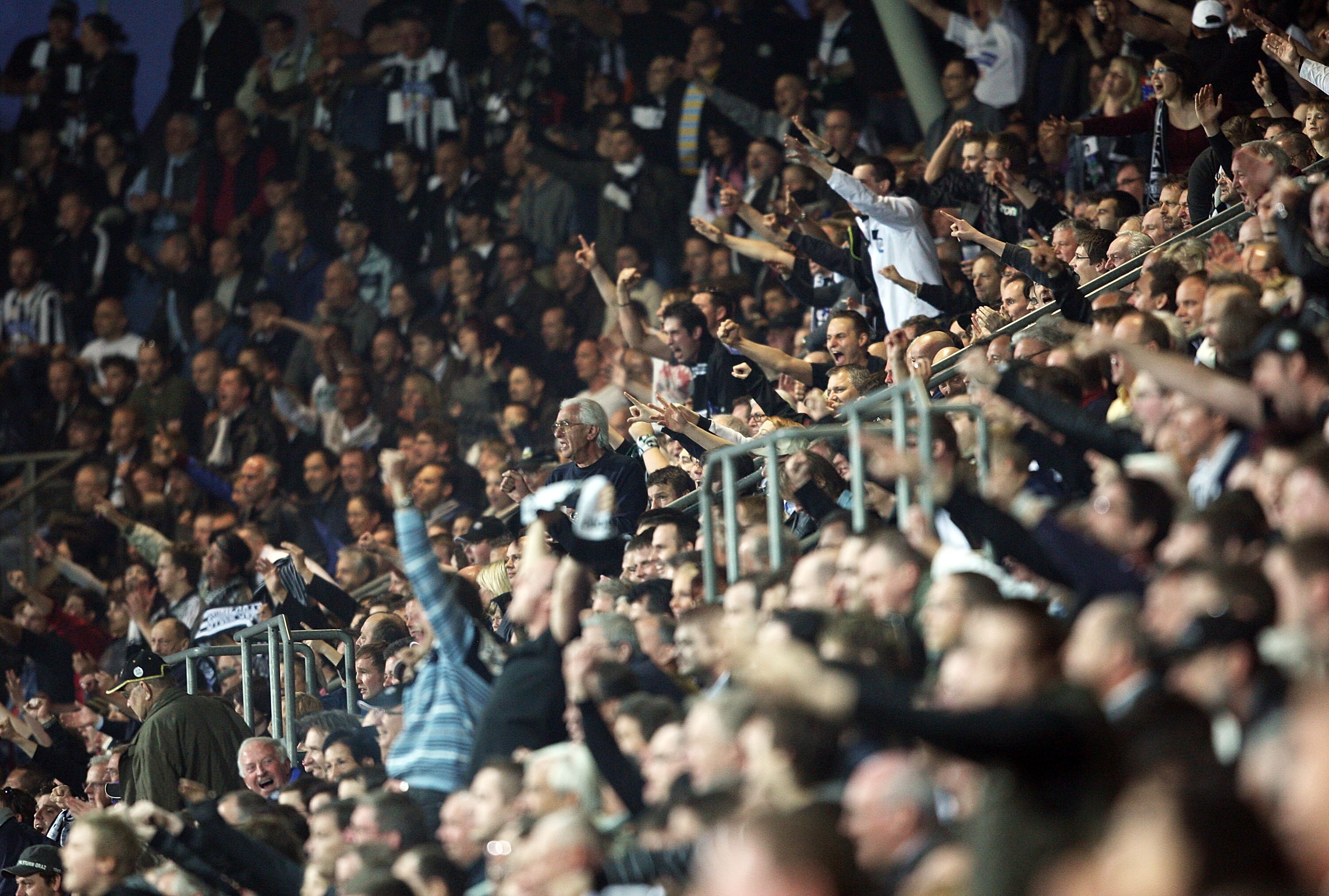 GRAZ, AUSTRIA - APRIL 02:  Supporters of Sturm celebrate during the tipp3-Bundesliga powered by T-Mobile match between SK Puntigamer Sturm Graz and SK Rapid Wien at UPC Arena on April 2, 2011 in Graz, Austria.  (Photo by Mathias Kniepeiss/Getty Images)