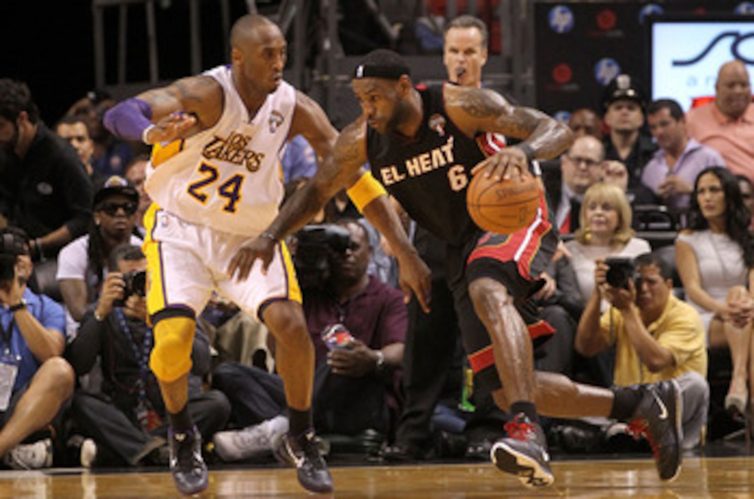 MIAMI, FL - MARCH 10:  LeBron James #6 of the Miami Heat posts up Kobe Bryant #24 of  the Los Angeles Lakers  during a game at American Airlines Arena on March 10, 2011 in Miami, Florida. NOTE TO USER: User expressly acknowledges and agrees that, by downl