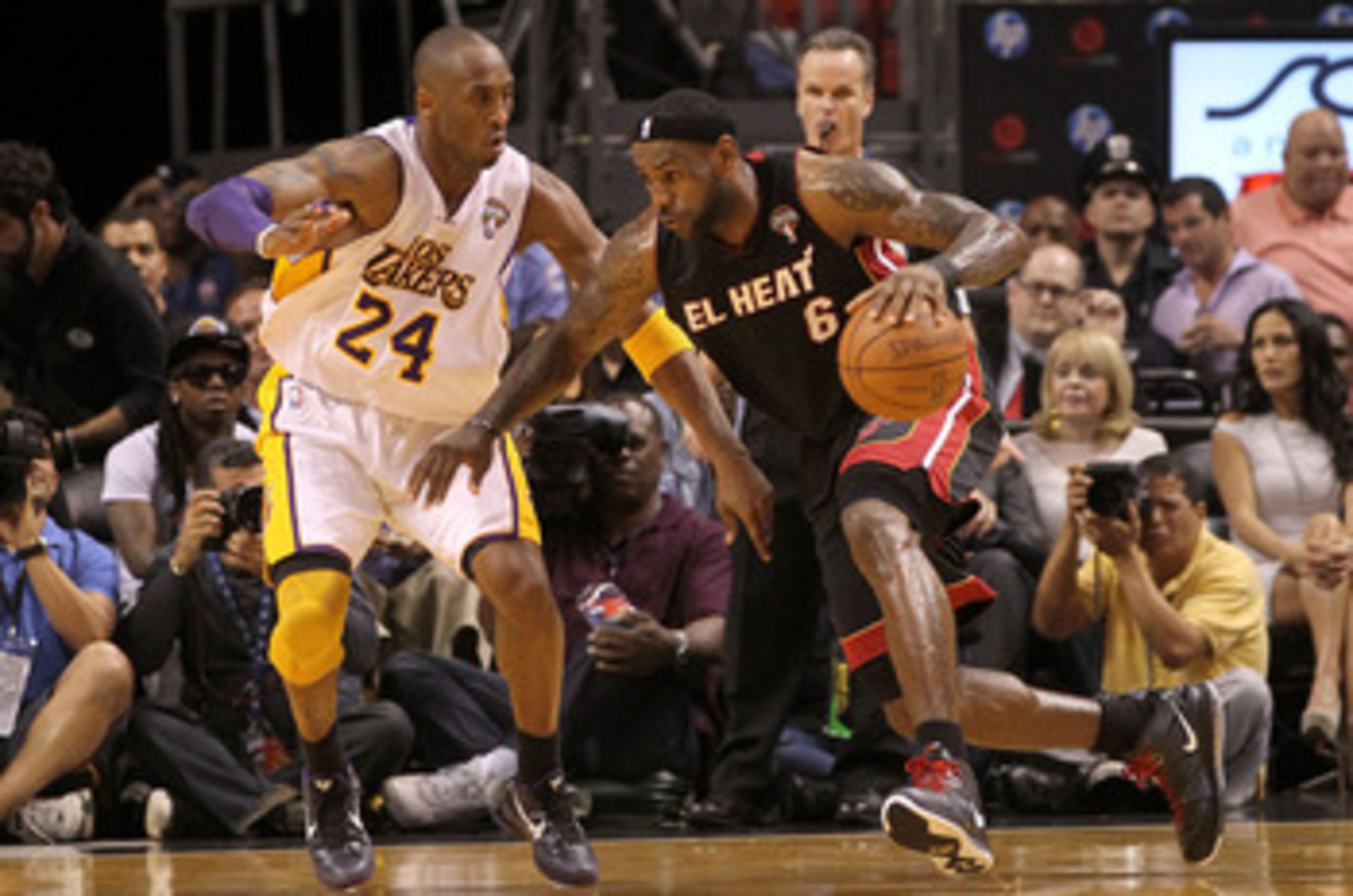 MIAMI, FL - MARCH 10: LeBron James #6 of the Miami Heat posts up Kobe Bryant #24 of the Los Angeles Lakers during a game at American Airlines Arena on March 10, 2011 in Miami, Florida. NOTE TO USER: User expressly acknowledges and agrees that, by downl MIAMI, FL - MARCH 10: LeBron James #6 of the Miami Heat posts up Kobe Bryant #24 of the Los Angeles Lakers during a game at American Airlines Arena on March 10, 2011 in Miami, Florida. NOTE TO USER: User expressly acknowledges and agrees that, by downl