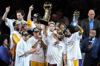 LOS ANGELES, CA - JUNE 17:  Derek Fisher #2 and Kobe Bryant #24 of the Los Angeles Lakers celebrate after the Lakers defeated the Boston Celtics 83-79 in Game Seven of the 2010 NBA Finals at Staples Center on June 17, 2010 in Los Angeles, California.  NOT