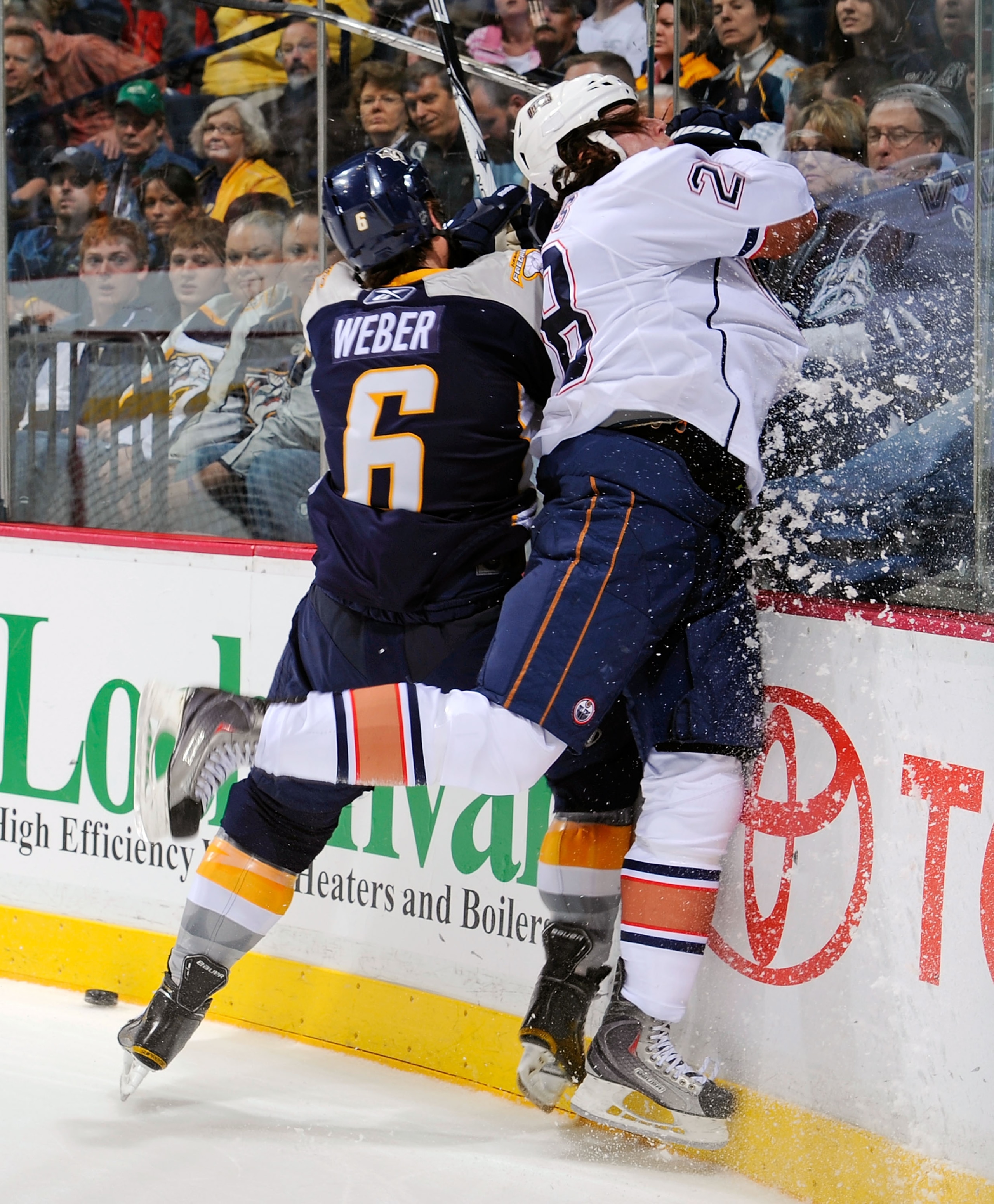 NASHVILLE, TN - MARCH 22: Shea Weber #6 of the Nashville Predators checks Ryan Jones #28 of the Edmonton Oilers on March 22, 2011 at the Bridgestone Arena in Nashville, Tennessee. (Photo by Frederick Breedon/Getty Images) NASHVILLE, TN - MARCH 22: Shea Weber #6 of the Nashville Predators checks Ryan Jones #28 of the Edmonton Oilers on March 22, 2011 at the Bridgestone Arena in Nashville, Tennessee. (Photo by Frederick Breedon/Getty Images)