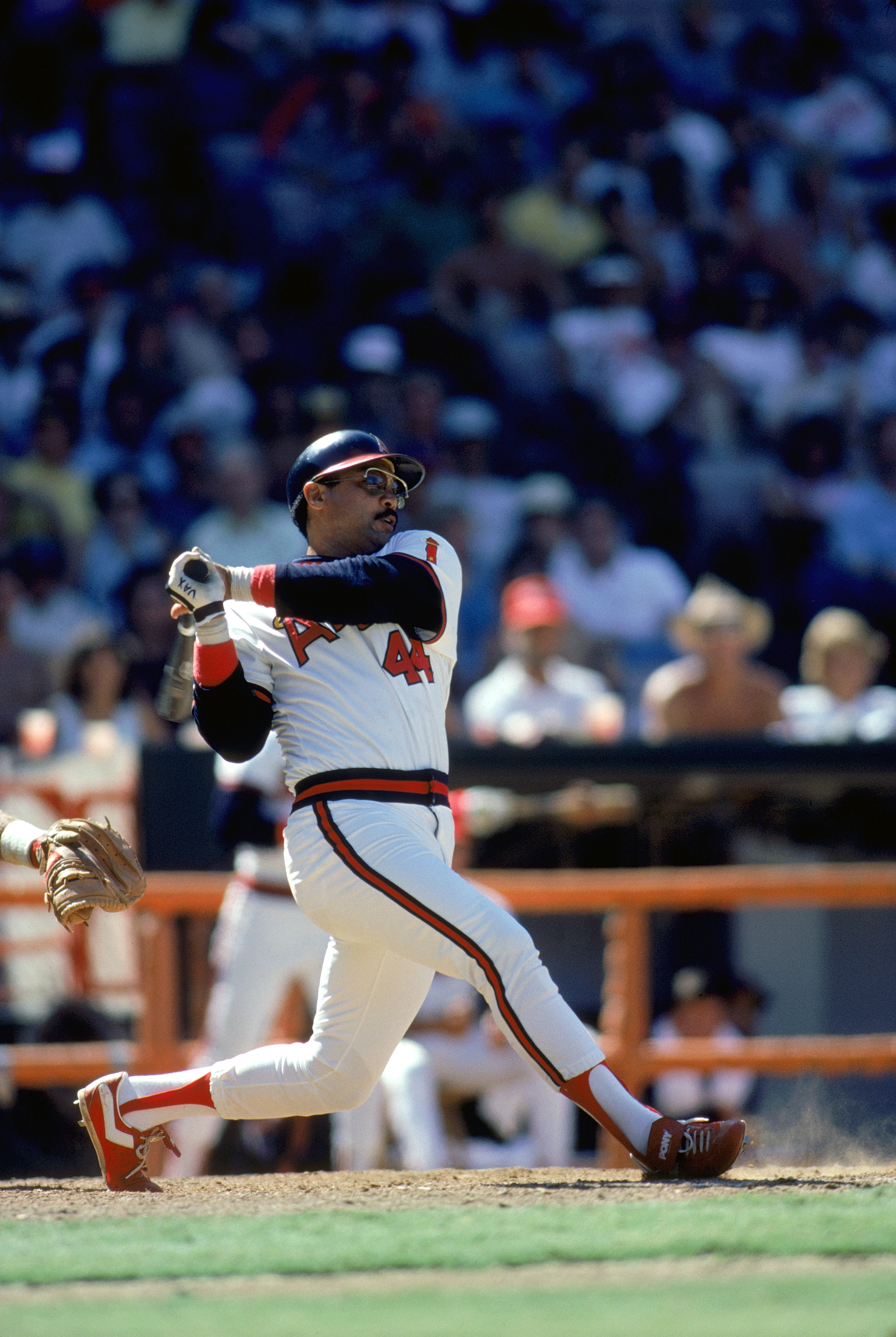 ANAHEIM, CA - 1984:  Reggie Jackson #44 of the California Angels watches the flight of his hit during a 1984 MLB game at Angel Stadium in Anaheim, California. (Photo by Rick Stewart/Getty Images)