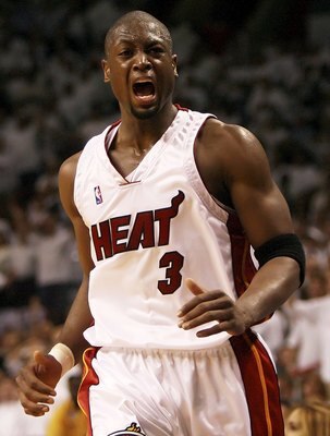 MIAMI - MAY 16:  Dwyane Wade #3 of the Miami Heat screams out after a play against the New Jersey Nets in game five of the Eastern Conference Semifinals during the 2006 NBA Playoffs on May 16, 2006 at the American Airlines Arena in Miami, Florida. The Hea