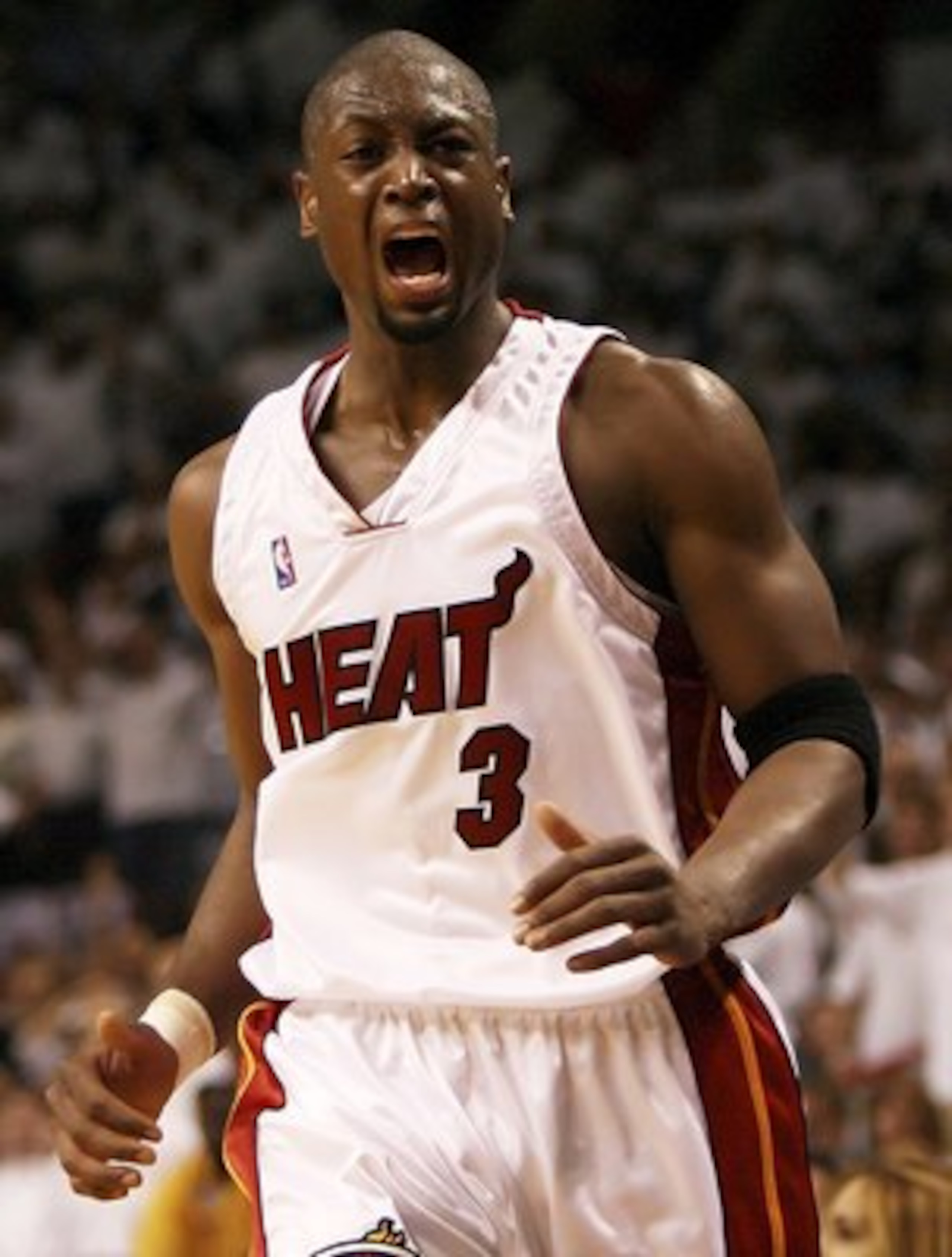MIAMI - MAY 16:  Dwyane Wade #3 of the Miami Heat screams out after a play against the New Jersey Nets in game five of the Eastern Conference Semifinals during the 2006 NBA Playoffs on May 16, 2006 at the American Airlines Arena in Miami, Florida. The Hea