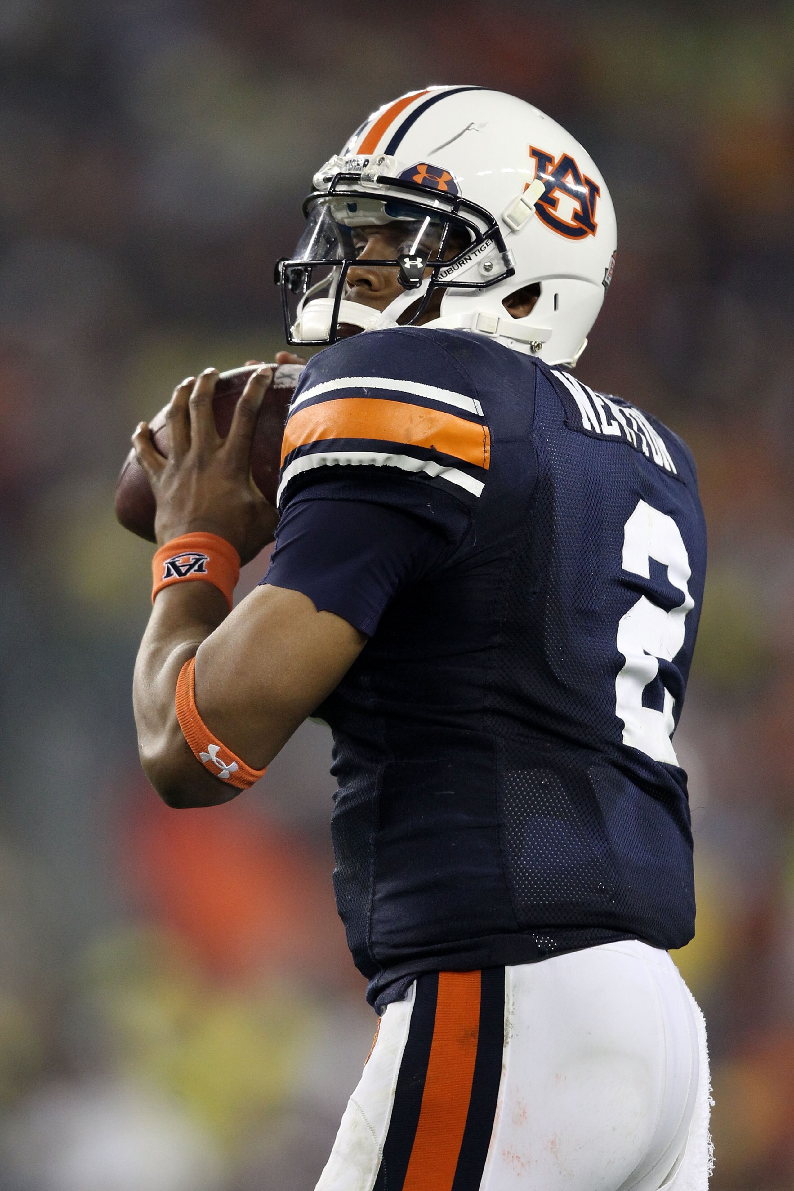 GLENDALE, AZ - JANUARY 10:  Cameron Newton #2 of the Auburn Tigers scrambles against the Oregon Ducks during the Tostitos BCS National Championship Game at University of Phoenix Stadium on January 10, 2011 in Glendale, Arizona.  (Photo by Christian Peters