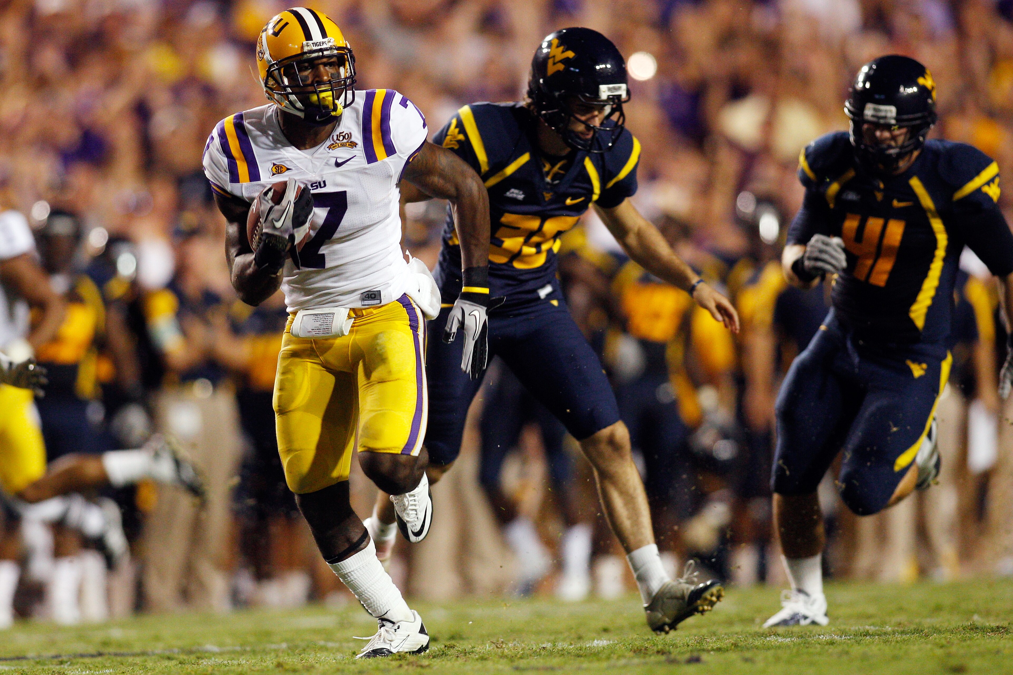 BATON ROUGE, LA - SEPTEMBER 25: Patrick Peterson #7 of the Louisiana State Univeristy Tigers runs for a touchdown against the West Virginia Mountaineers at Tiger Stadium on September 25, 2010 in Baton Rouge, Louisiana. (Photo by Chris Graythen/Getty Ima BATON ROUGE, LA - SEPTEMBER 25: Patrick Peterson #7 of the Louisiana State Univeristy Tigers runs for a touchdown against the West Virginia Mountaineers at Tiger Stadium on September 25, 2010 in Baton Rouge, Louisiana. (Photo by Chris Graythen/Getty Ima