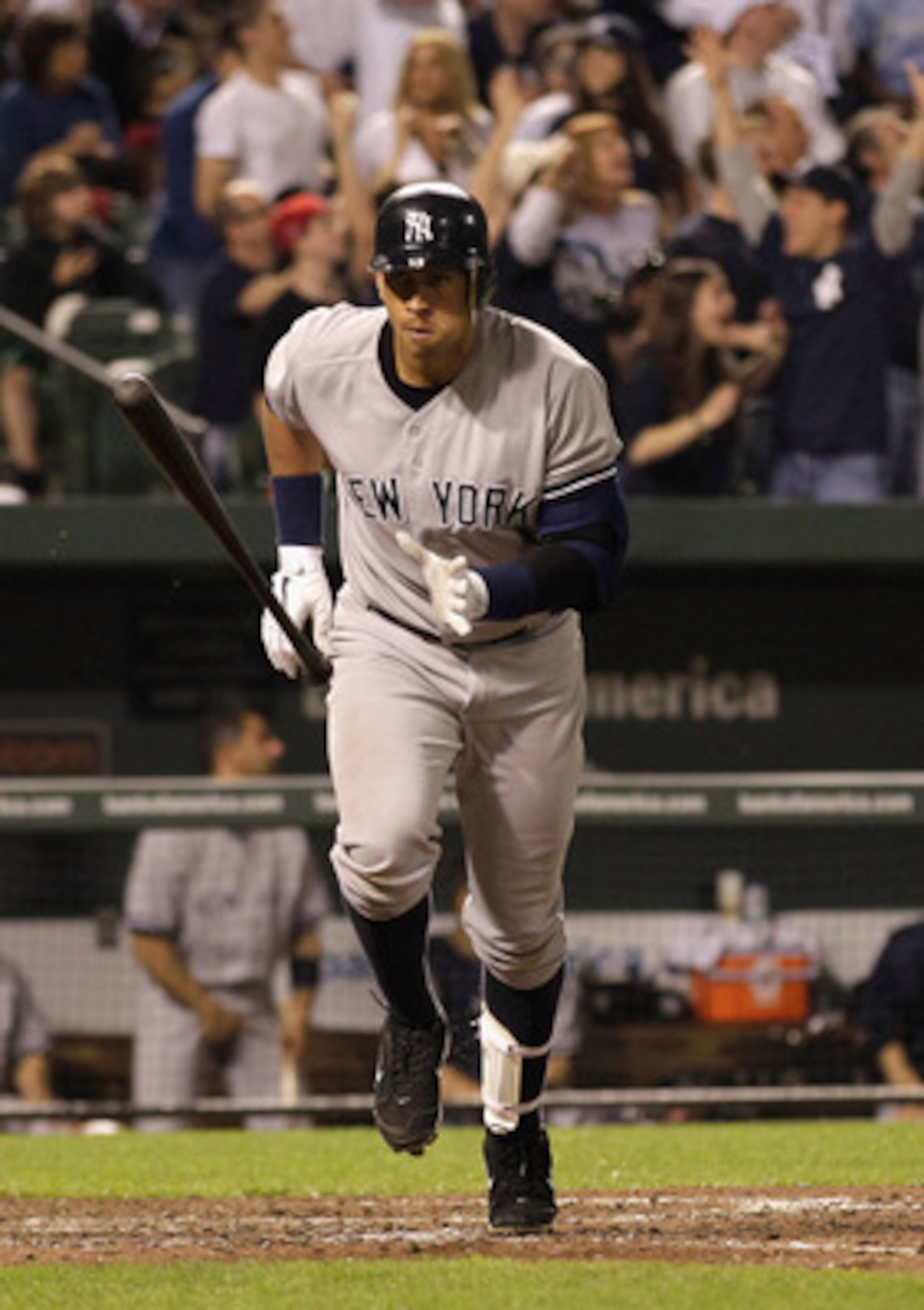 BALTIMORE, MD - APRIL 23:  Alex Rodriguez #13 of the New York Yankees tosses his bat after hitting a  grand slam home run against the Baltimore Orioles during the eighth inning at Oriole Park at Camden Yards on April 23, 2011 in Baltimore, Maryland.  (Pho
