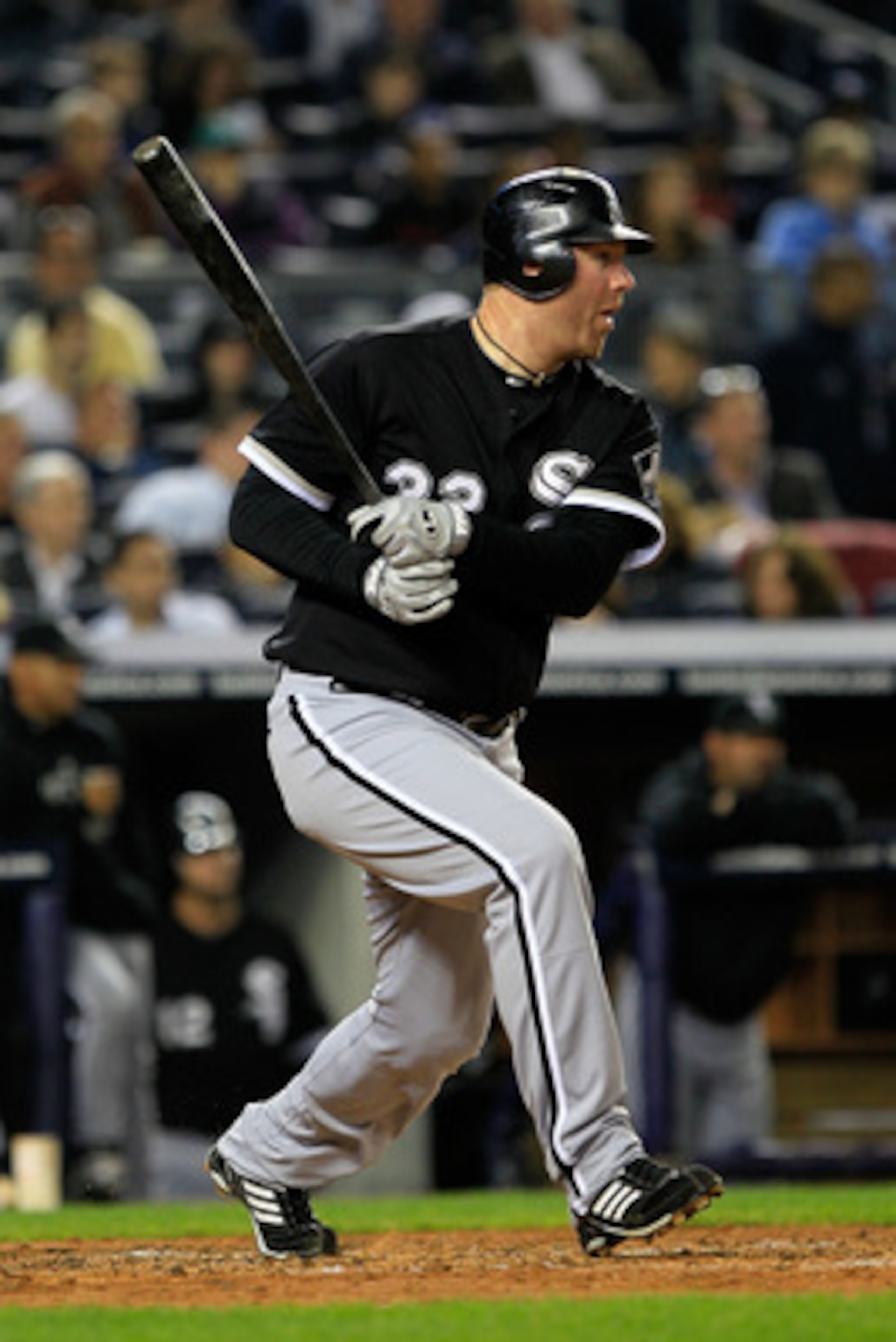 NEW YORK, NY - APRIL 25:  Adam Dunn #32 of the Chicago White Sox grounds out as his teammate Carlos Quentin scores in the third inning against the New York Yankees at Yankee Stadium on April 25, 2011 in the Bronx borough of New York City.  (Photo by Chris