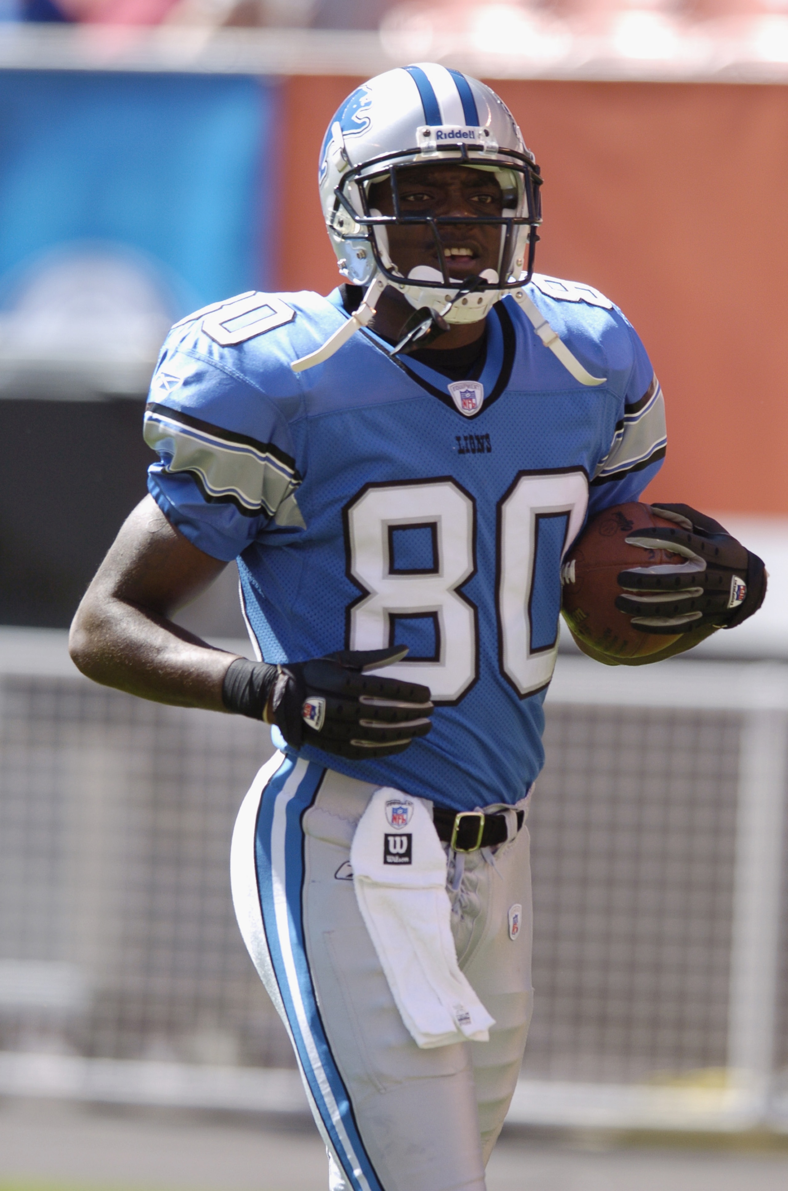 CLEVELAND - AUGUST 21:  Wide receiver Charles Rogers #80 of the Detroit Lions carries the ball during the NFL preseason game against the Cleveland Browns on August 21, 2004 at Cleveland Browns Stadium in Cleveland, Ohio.  Cleveland defeated Detroit 17-10.