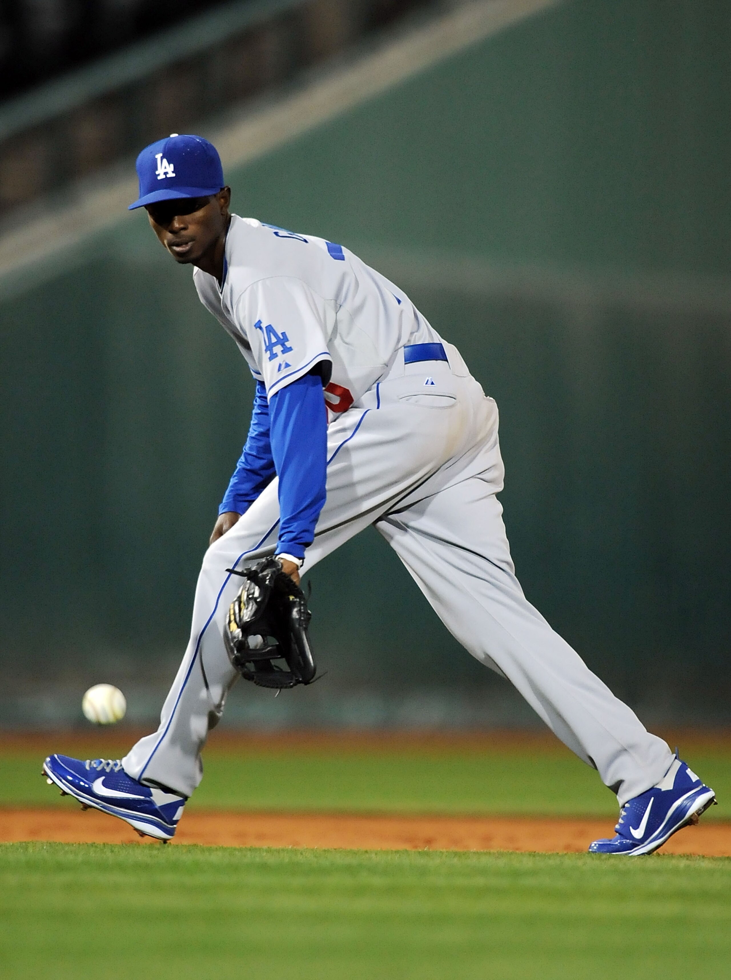 GOODYEAR, AZ - MARCH 03:  Dee Gordon #70 of the Los Angeles Dodgers gets ready to field a ground ball against the Cincinnati Reds at Goodyear Ballpark on March 3, 2011 in Goodyear, Arizona.  (Photo by Norm Hall/Getty Images)