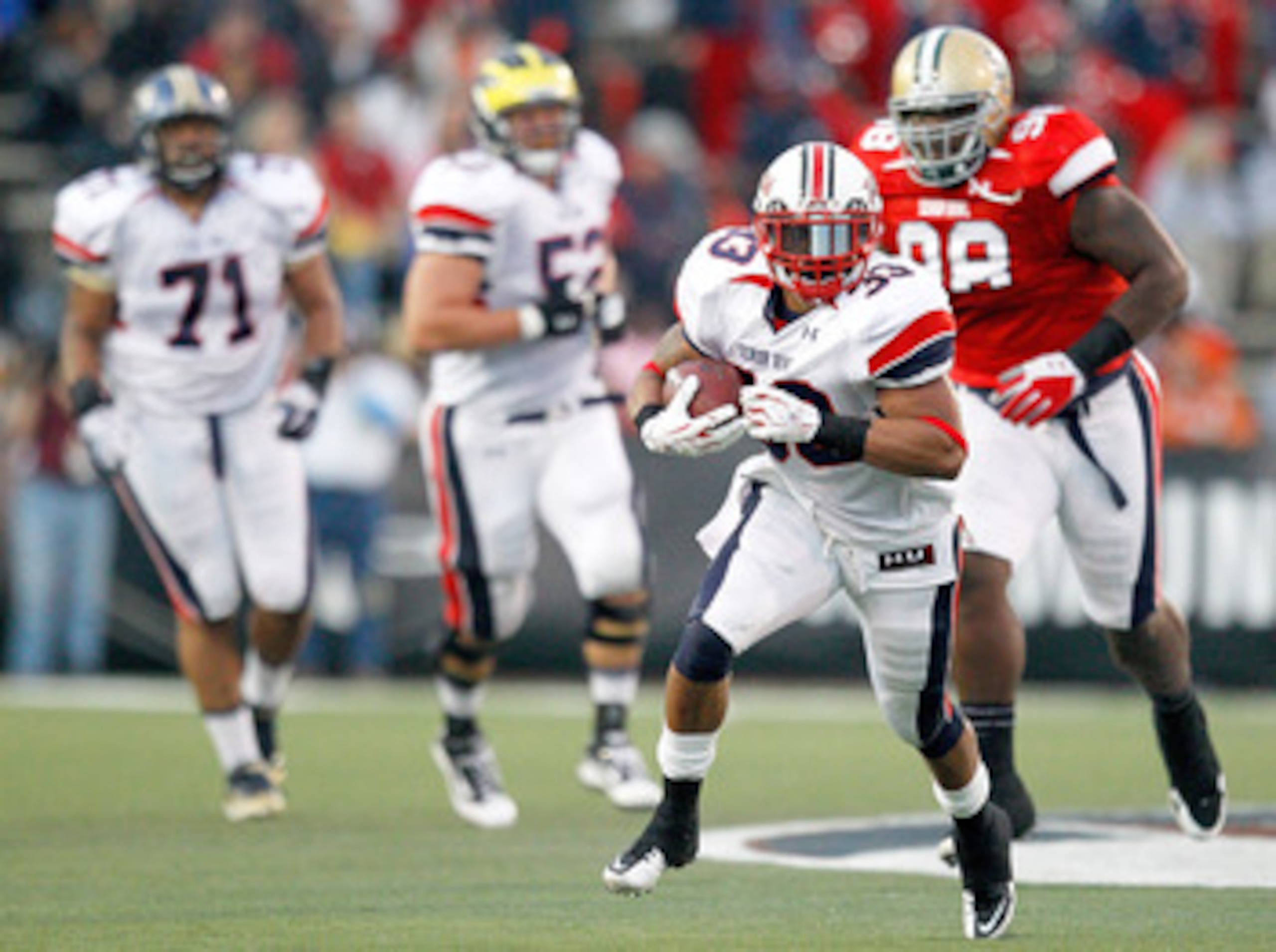 MOBILE, AL - JANUARY 29: Running back Da'Rel Scott #33 of the North Team rushes for a first down against the South during third quarter of the Under Armour Senior Bowl on January 29, 2011 at Ladd-Pebbles Stadium in Mobile, Alabama. (Photo by Sean Gardner MOBILE, AL - JANUARY 29: Running back Da'Rel Scott #33 of the North Team rushes for a first down against the South during third quarter of the Under Armour Senior Bowl on January 29, 2011 at Ladd-Pebbles Stadium in Mobile, Alabama. (Photo by Sean Gardner