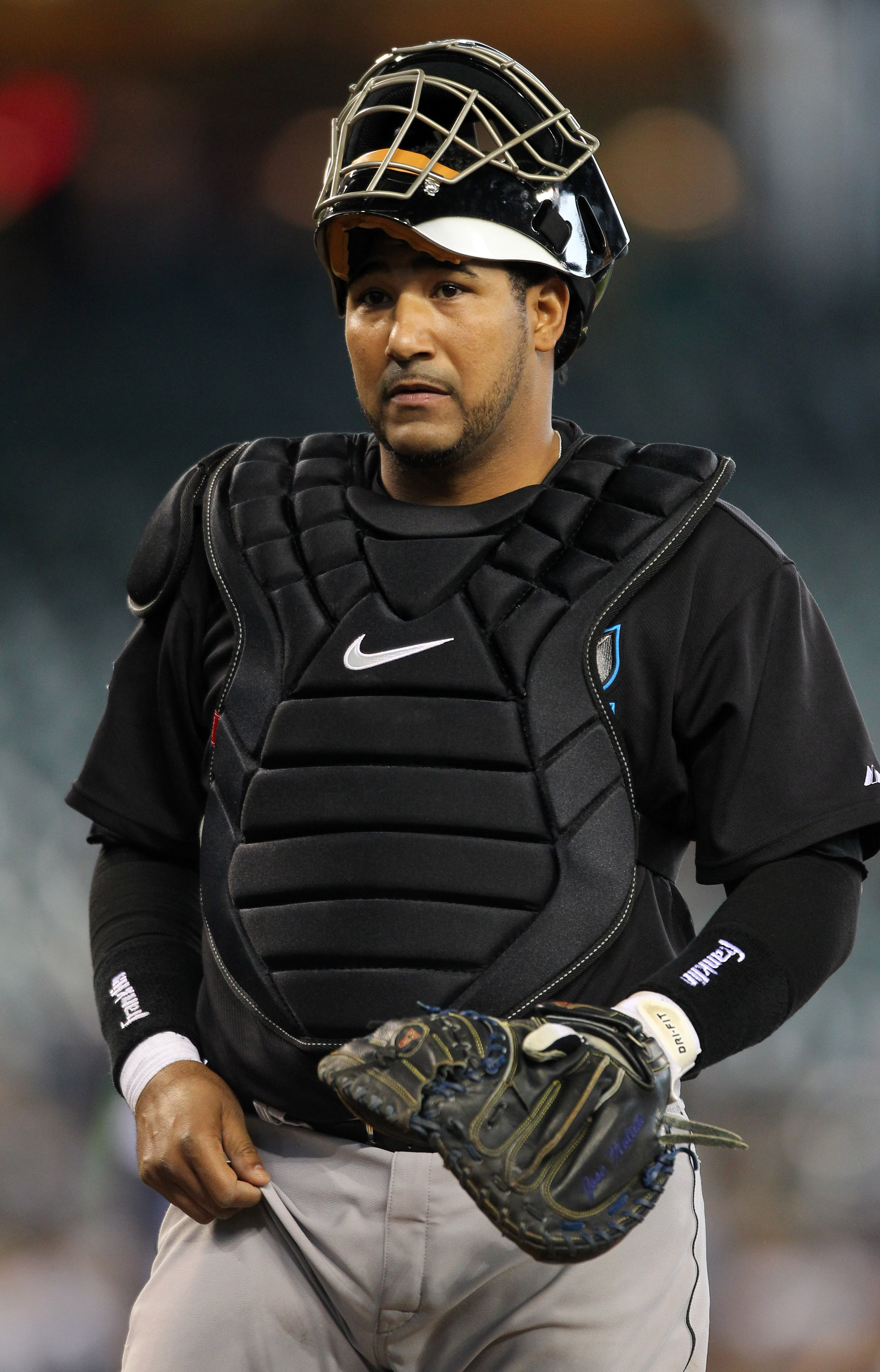 Toronto Blue Jays catcher Jose Molina (8) is congratulated by