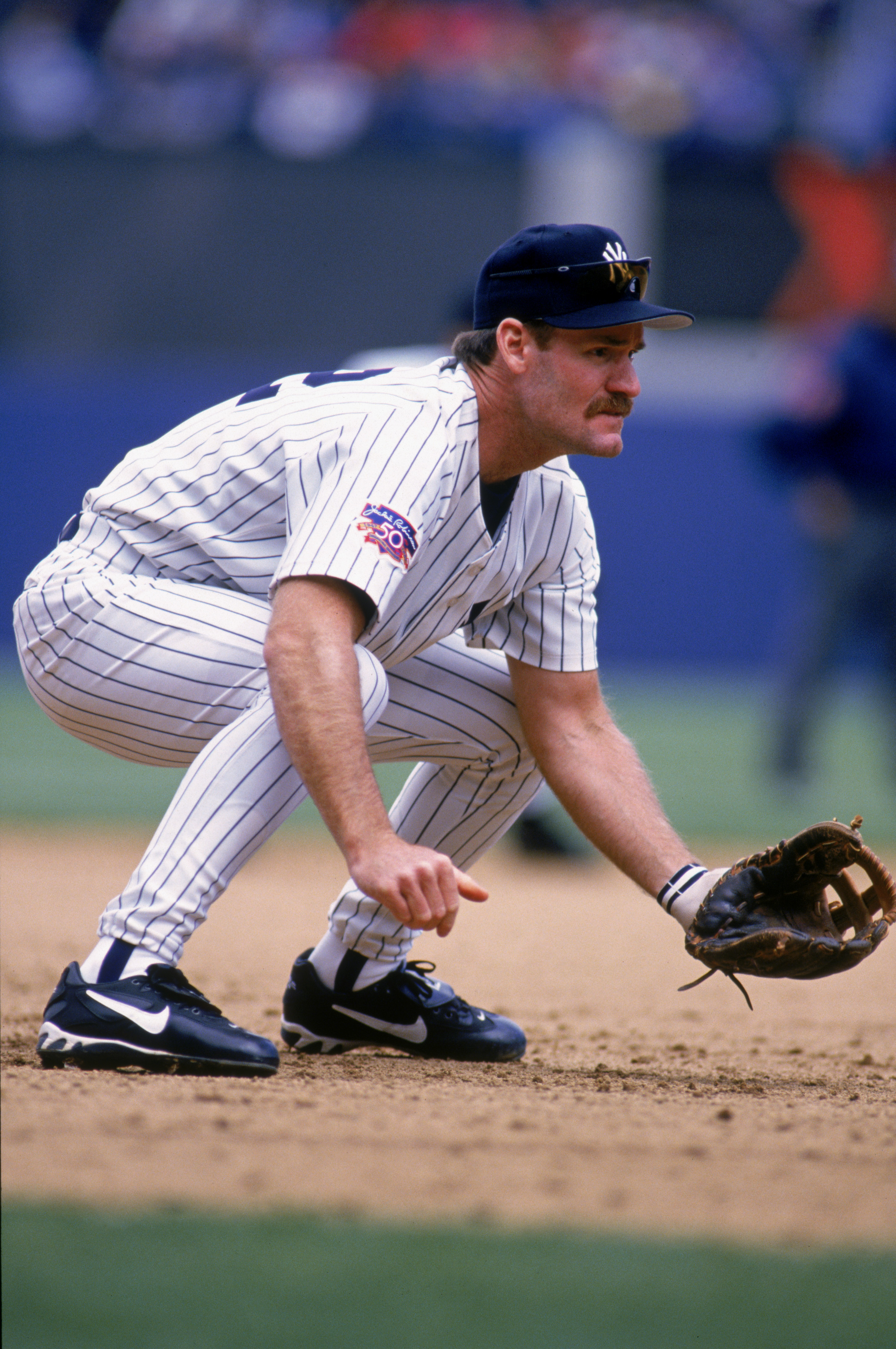 BRONX - MAY 22:  Wade Boggs #12 of the New York Yankees plays defense against Boston Red Sox during the game at Yankee Stadium in the Bronx, New York, on May 22, 1997.  The Re Sox won 8-2. (Photo by Bernie Nunez/Getty Images)