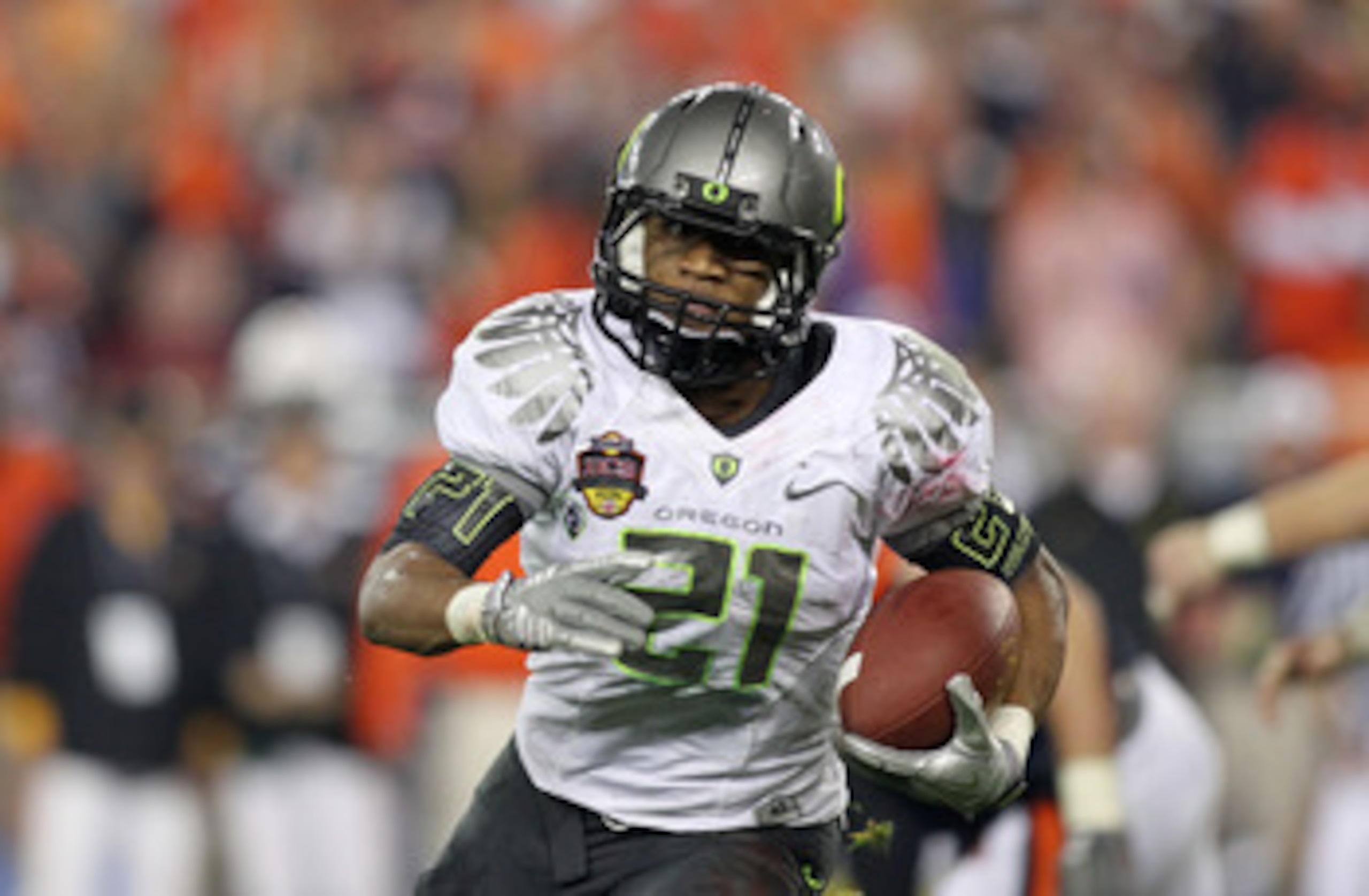 GLENDALE, AZ - JANUARY 10: LaMichael James #21 of the Oregon Ducks runs down field against the Auburn Tigers during the Tostitos BCS National Championship Game at University of Phoenix Stadium on January 10, 2011 in Glendale, Arizona. (Photo by Jonathan GLENDALE, AZ - JANUARY 10: LaMichael James #21 of the Oregon Ducks runs down field against the Auburn Tigers during the Tostitos BCS National Championship Game at University of Phoenix Stadium on January 10, 2011 in Glendale, Arizona. (Photo by Jonathan