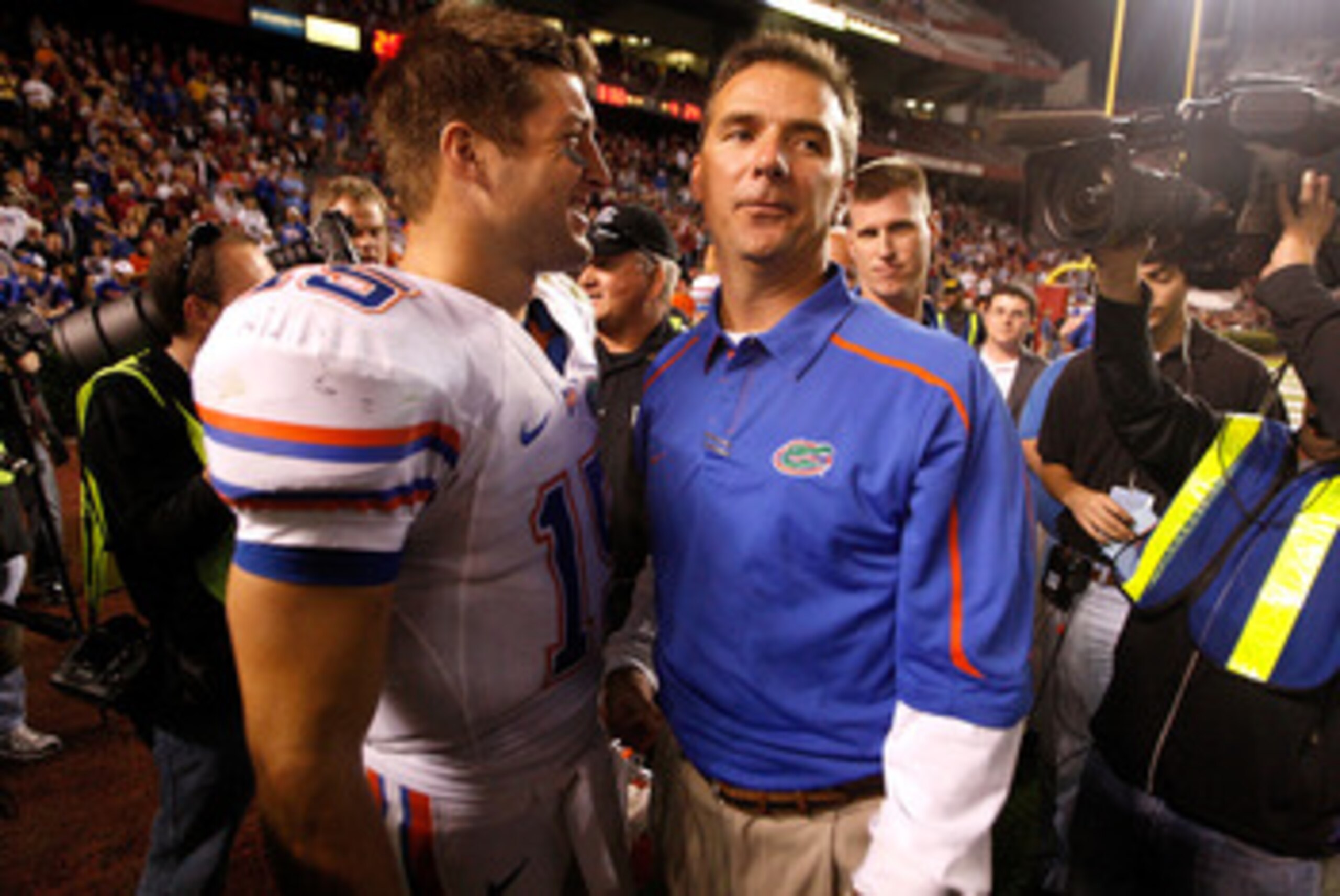COLUMBIA, SC - NOVEMBER 14: Head coach Urban Meyer and quarterback Tim Tebow #15 of the Florida Gators celebrate after a 24-14 victory over the South Carolina Gamecocks during their game at Williams-Brice Stadium on November 14, 2009 in Columbia, South C COLUMBIA, SC - NOVEMBER 14: Head coach Urban Meyer and quarterback Tim Tebow #15 of the Florida Gators celebrate after a 24-14 victory over the South Carolina Gamecocks during their game at Williams-Brice Stadium on November 14, 2009 in Columbia, South C