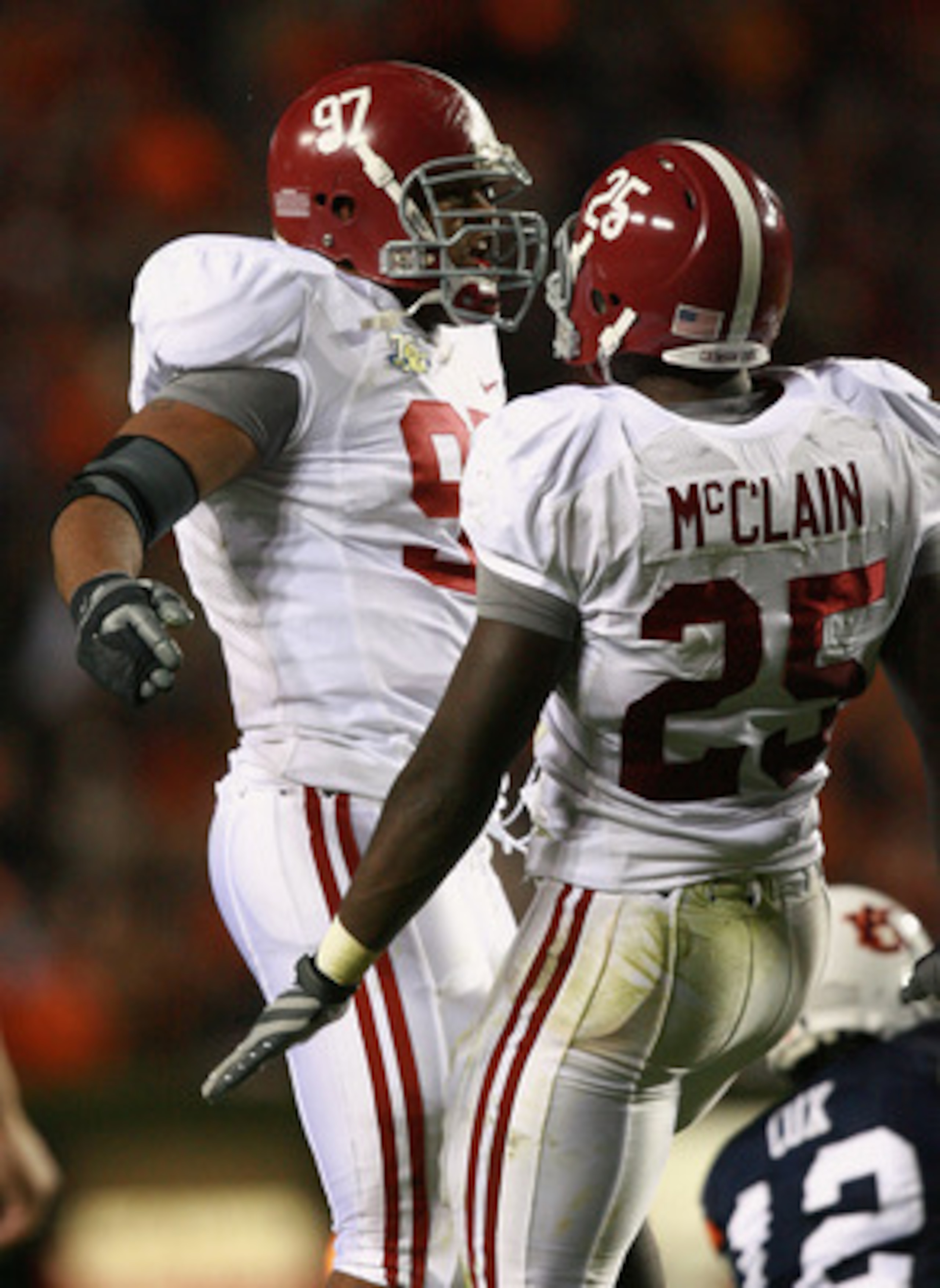 AUBURN, AL - NOVEMBER 24: Defensive lineman Lorenzo Washington #97 and Rolando McClain #25 of the Alabama Crimson Tide celebrate after sacking quarterback Brandon Cox #12 of the Auburn Tigers at Jordan-Hare Stadium on November 24, 2007 in Auburn, Alabama AUBURN, AL - NOVEMBER 24: Defensive lineman Lorenzo Washington #97 and Rolando McClain #25 of the Alabama Crimson Tide celebrate after sacking quarterback Brandon Cox #12 of the Auburn Tigers at Jordan-Hare Stadium on November 24, 2007 in Auburn, Alabama