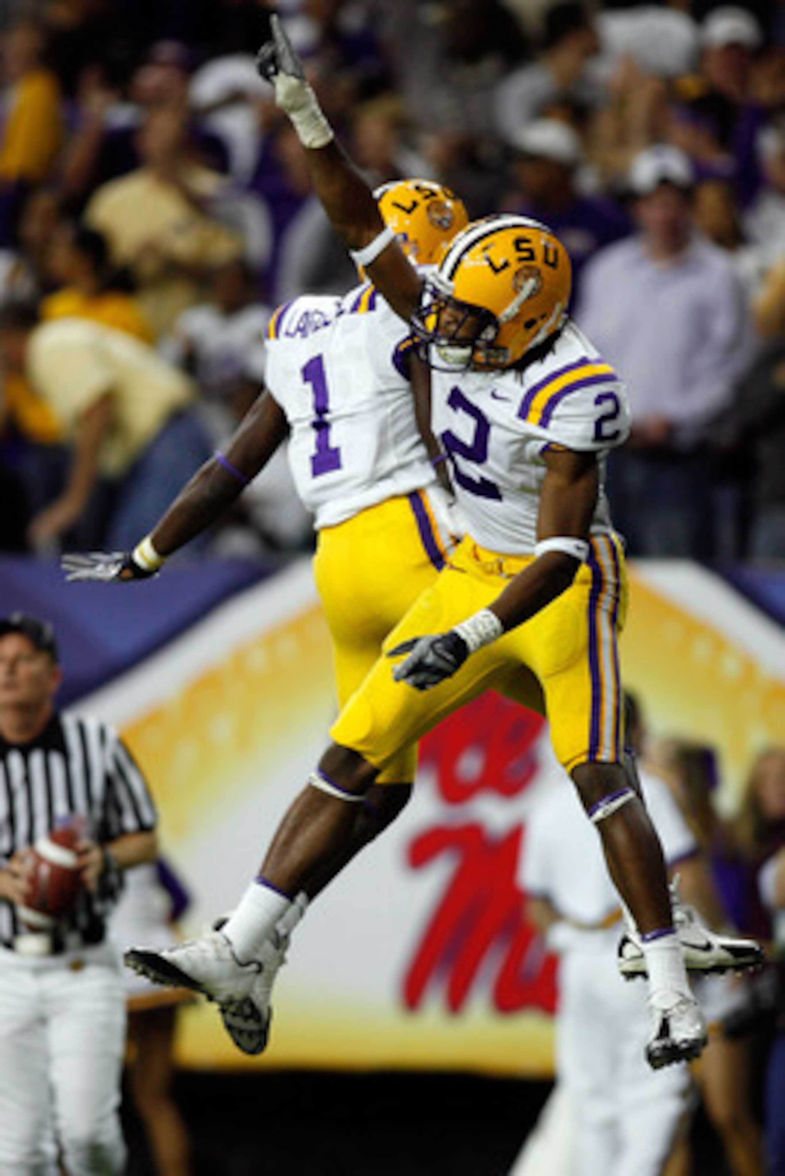 ATLANTA - DECEMBER 01: Brandon LaFell#1 and Demetrius Byrd #2 of the Louisiana State University Tigers celebrate after Byrd caught a touchdown pass against the University of Tennessee Volunteers in the SEC Championship game on December 1, 2007 at the Geo ATLANTA - DECEMBER 01: Brandon LaFell#1 and Demetrius Byrd #2 of the Louisiana State University Tigers celebrate after Byrd caught a touchdown pass against the University of Tennessee Volunteers in the SEC Championship game on December 1, 2007 at the Geo