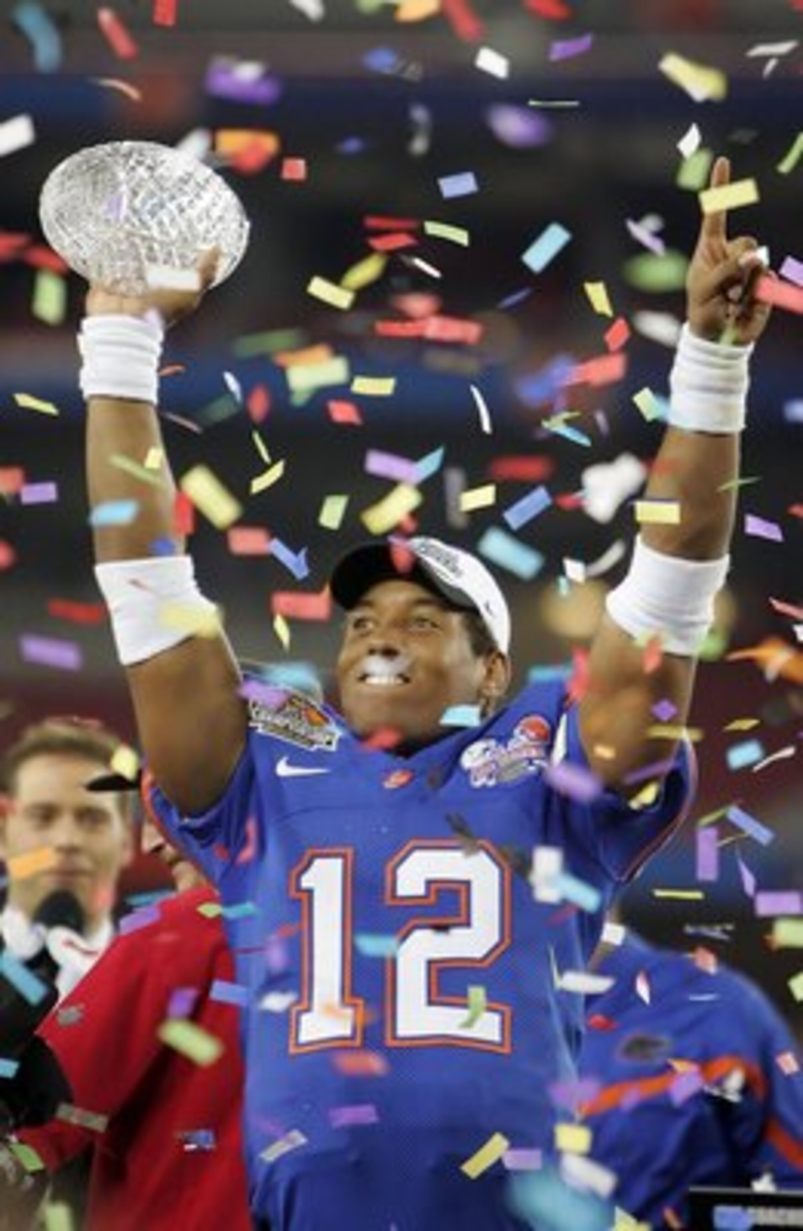 GLENDALE, AZ - JANUARY 08: Quarterback Chris Leak #12 of the Florida Gators celebrates with the BCS championship trophy after defeating the Ohio State Buckeyes after the 2007 Tostitos BCS National Championship Game at the University of Phoenix Stadium on GLENDALE, AZ - JANUARY 08: Quarterback Chris Leak #12 of the Florida Gators celebrates with the BCS championship trophy after defeating the Ohio State Buckeyes after the 2007 Tostitos BCS National Championship Game at the University of Phoenix Stadium on