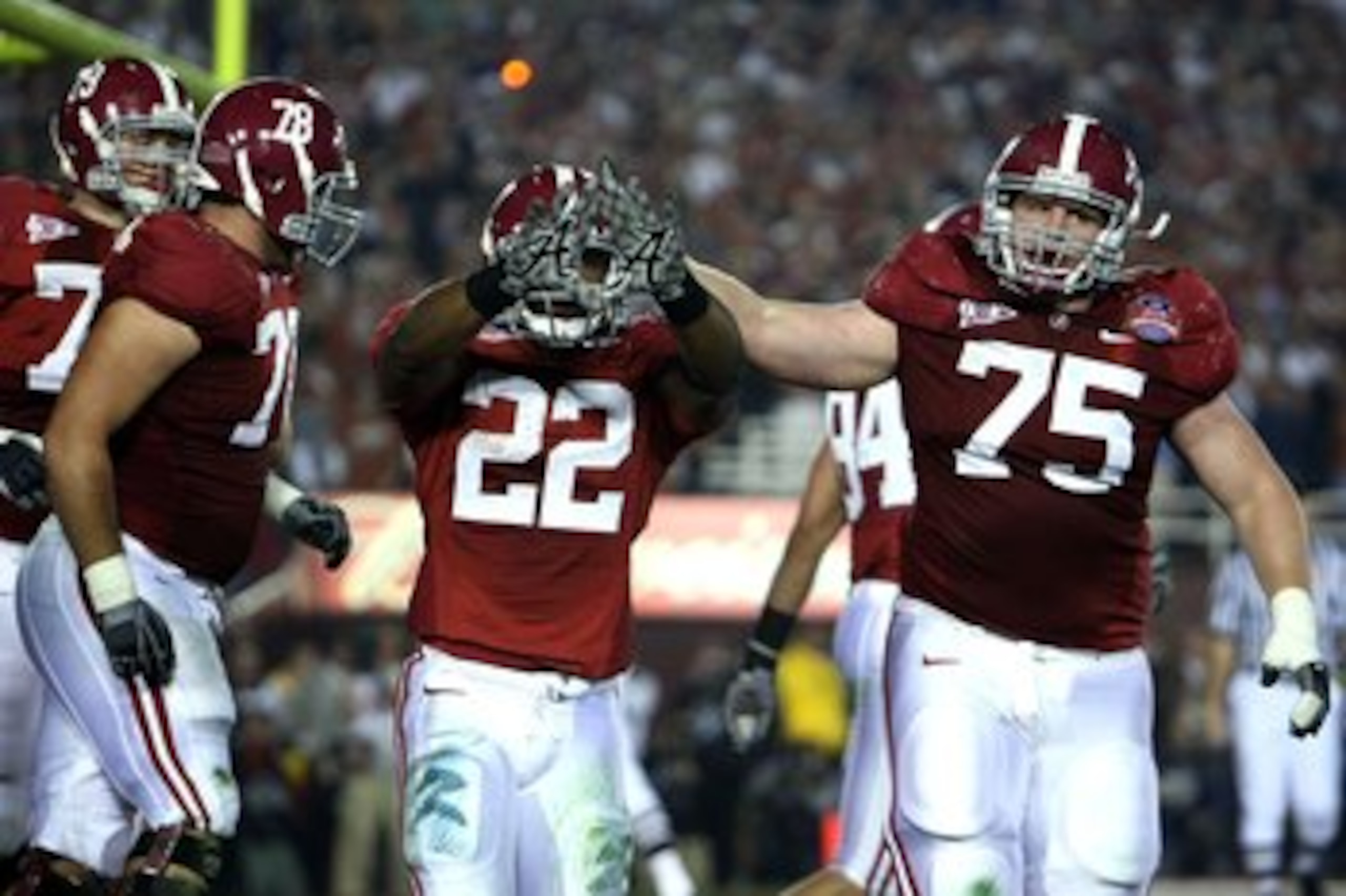 PASADENA, CA - JANUARY 07: Running back Mark Ingram #22 of the Alabama Crimson Tide celebrates a touchdown with teammates against the Texas Longhorns in the second quarter of the Citi BCS National Championship game at the Rose Bowl on January 7, 2010 in PASADENA, CA - JANUARY 07: Running back Mark Ingram #22 of the Alabama Crimson Tide celebrates a touchdown with teammates against the Texas Longhorns in the second quarter of the Citi BCS National Championship game at the Rose Bowl on January 7, 2010 in