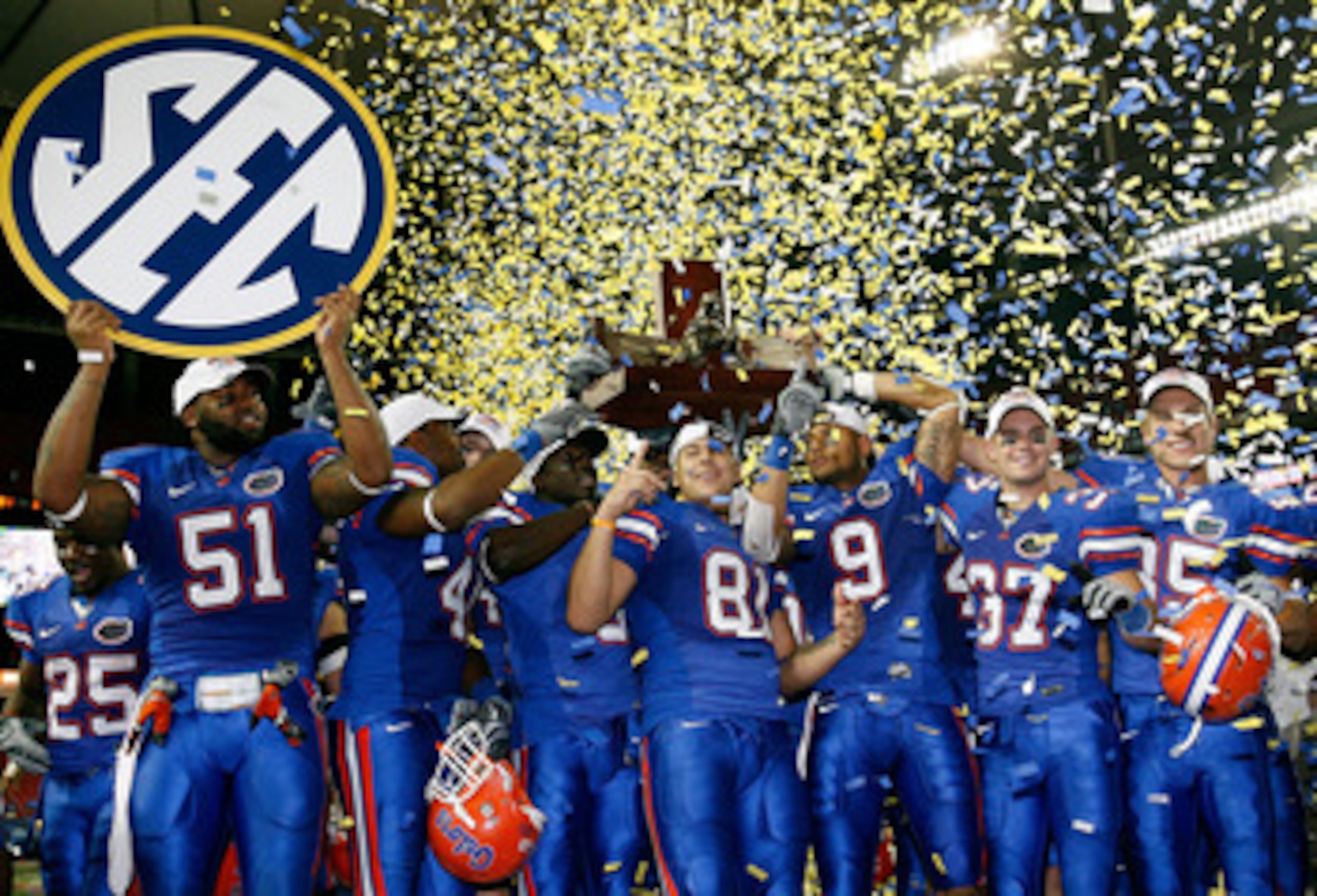 ATLANTA - DECEMBER 06: The Florida Gators celebrate their 31-20 win over the Alabama Crimson Tide in the SEC Championship on December 6, 2008 at the Georgia Dome in Atlanta, Georgia. (Photo by Kevin C. Cox/Getty Images) ATLANTA - DECEMBER 06: The Florida Gators celebrate their 31-20 win over the Alabama Crimson Tide in the SEC Championship on December 6, 2008 at the Georgia Dome in Atlanta, Georgia. (Photo by Kevin C. Cox/Getty Images)