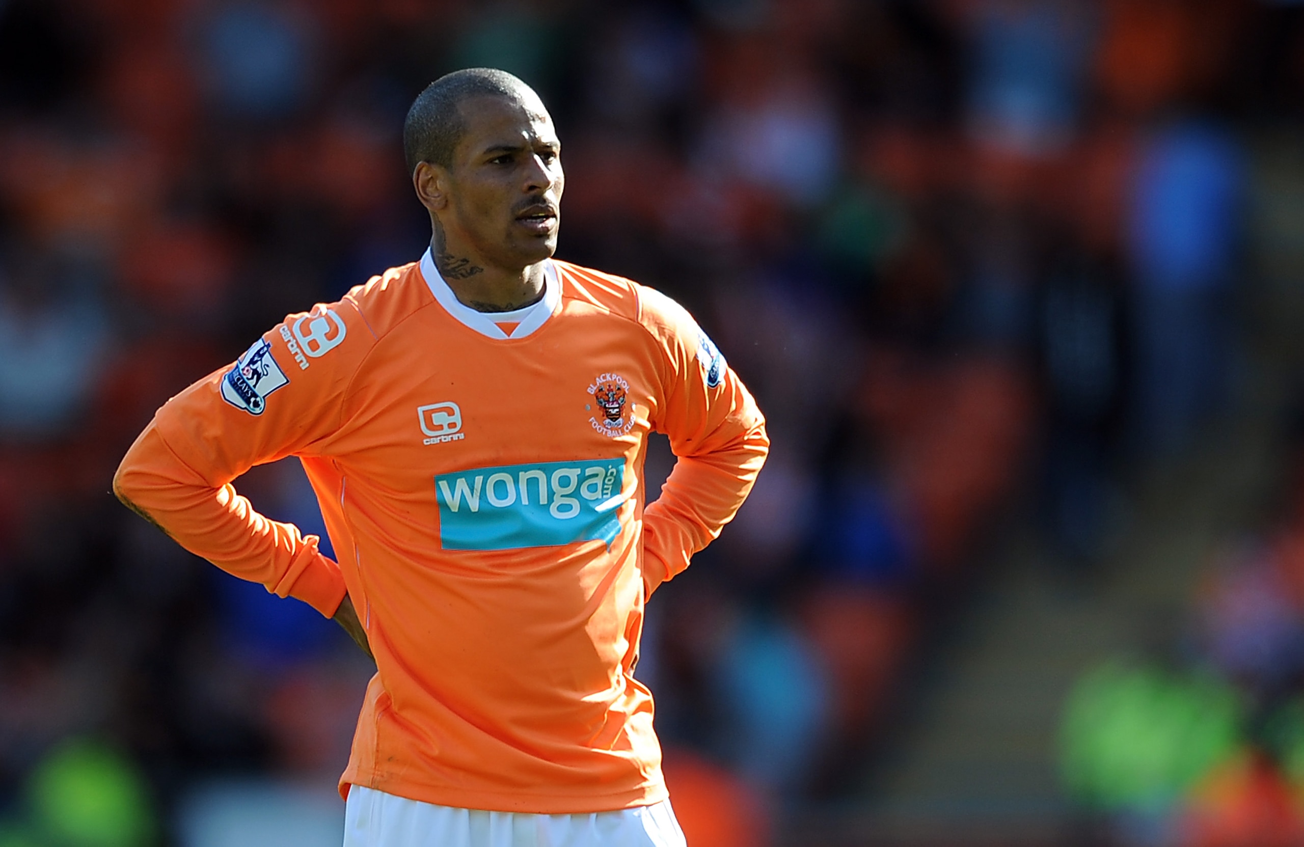 BLACKPOOL, ENGLAND - APRIL 16:  DJ Campbell of Blackpool looks on during the Barclays Premier League match between Blackpool and Wigan Athletic at Bloomfield Road on April 16, 2011 in Blackpool, England.  (Photo by Chris Brunskill/Getty Images)