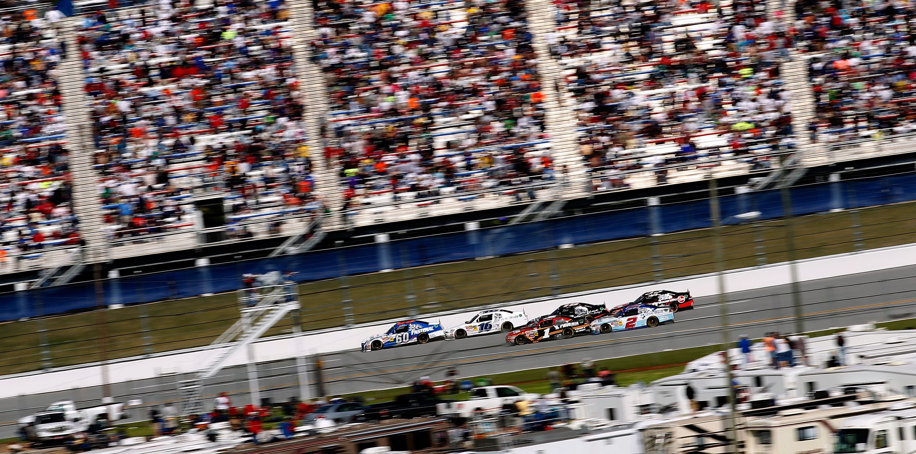 TALLADEGA, AL - APRIL 16:  Carl Edwards, driver of the #60 Fastenal Ford, leads a group of cars during the NASCAR Nationwide Series Aaron's 312 at Talladega Superspeedway on April 16, 2011 in Talladega, Alabama.  (Photo by Tom Pennington/Getty Images for