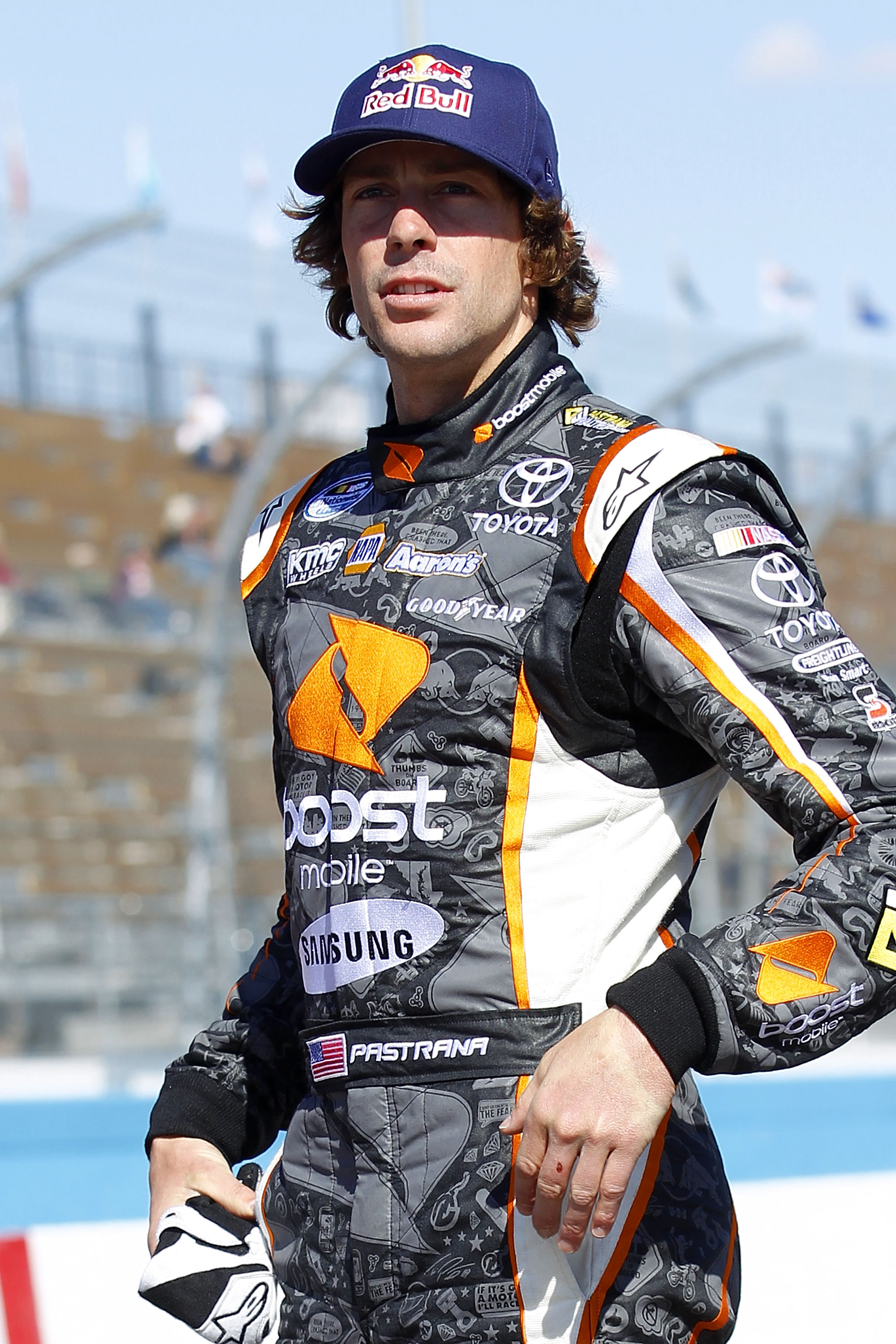 AVONDALE, AZ - FEBRUARY 24:  Travis Pastrana, driver of the #99 Boost Mobile Toyota, waits on pit road during qualifying for the NASCAR K&N Pro Series West 3 Amigos Organic Blanco 100 at Phoenix International Raceway on February 24, 2011 in Avondale, Ariz