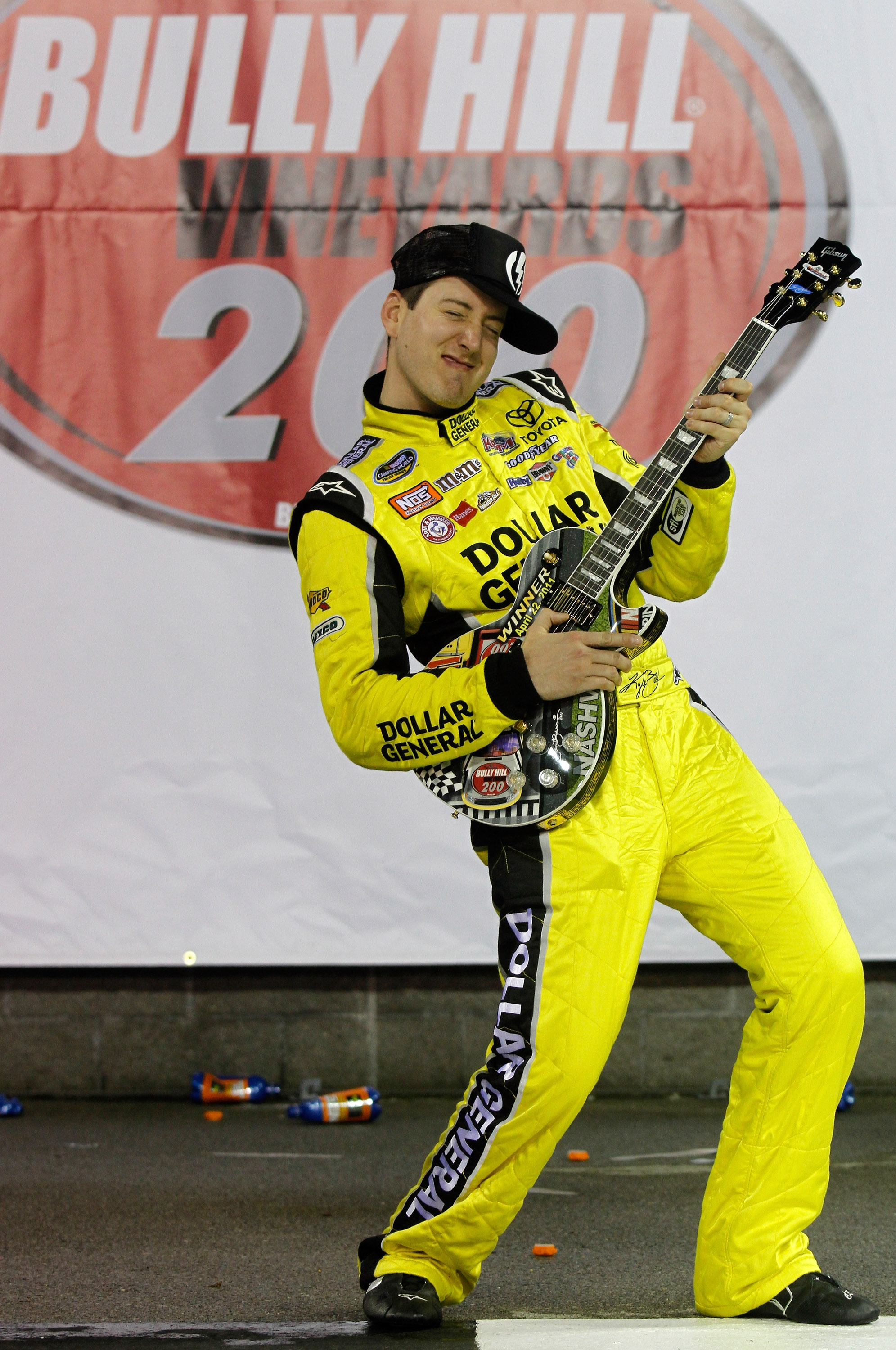 LEBANON, TN - APRIL 22:  Kyle Busch, driver of the #18 Dollar General Toyota celebrates in victory lane after winning the NASCAR Camping World Truck Series Bully Hill Vineyards 200 at Nashville Superspeedway on April 22, 2011 in Lebanon, Tennessee.  (Phot