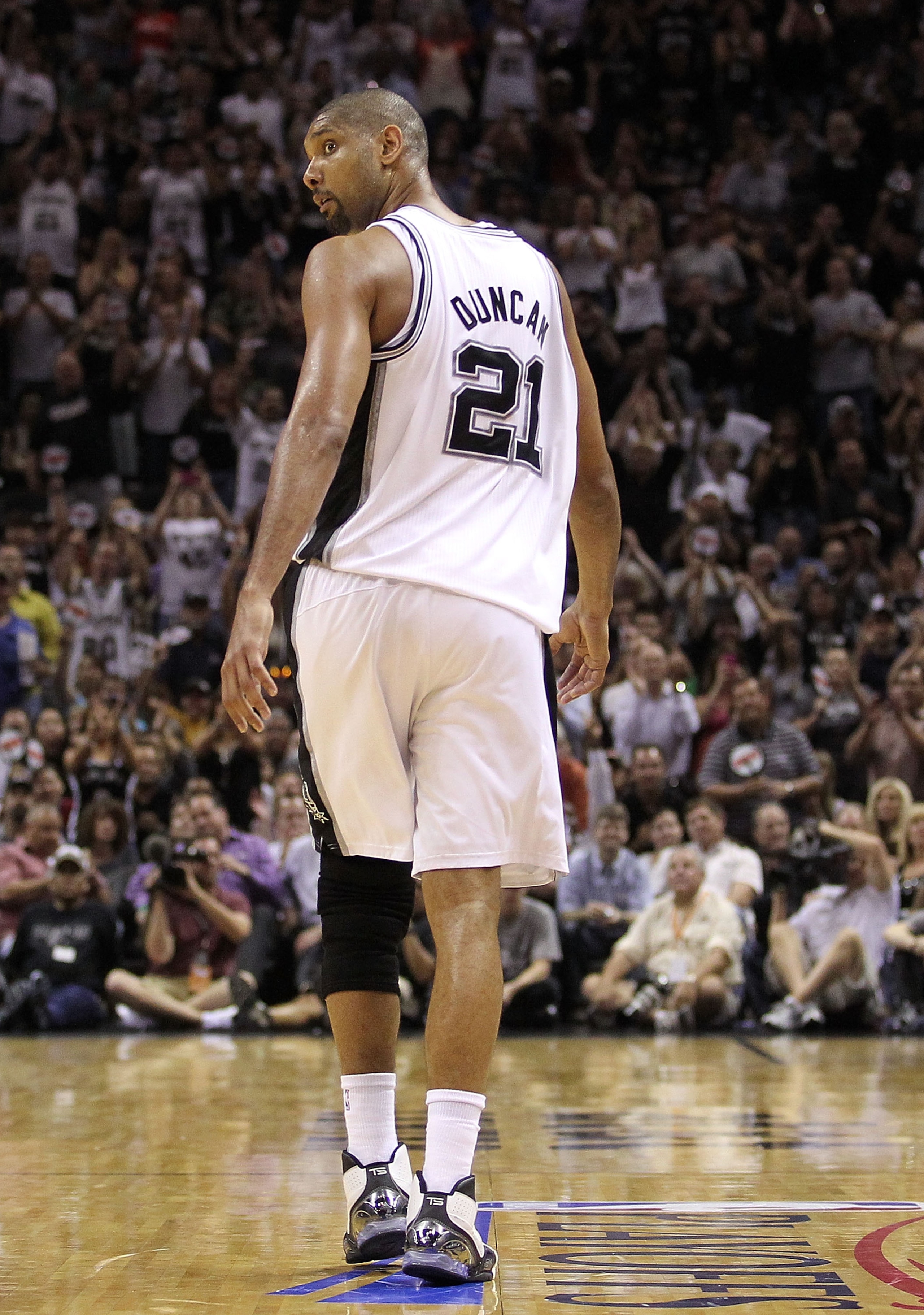 SAN ANTONIO, TX - APRIL 20:  Forward Tim Duncan #21 of the San Antonio Spurs walks off the court after fouling out against the Memphis Grizzlies in Game Two of the Western Conference Quarterfinals in the 2011 NBA Playoffs on April 20, 2011 at AT&T Center