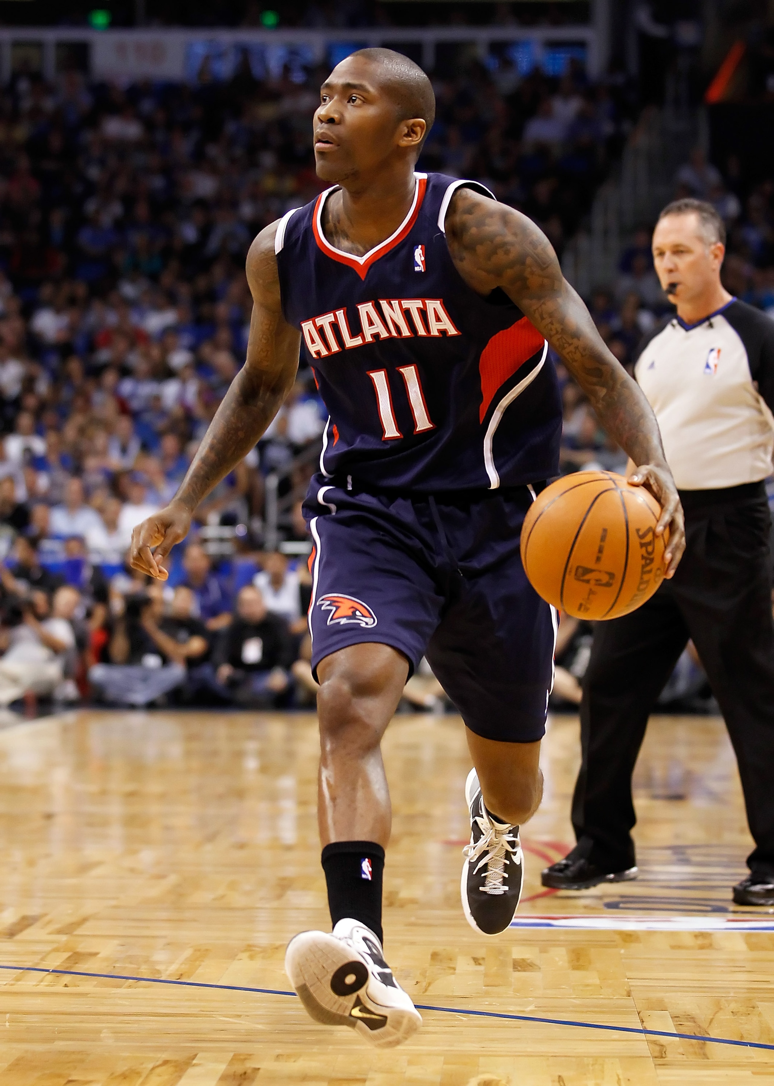ORLANDO, FL - APRIL 26:  Jamal Crawford #11 of the Atlanta Hawks drives against the Orlando Magic during Game Five of the Eastern Conference Quarterfinals of the 2011 NBA Playoffs on April 26, 2011 at the Amway Arena in Orlando, Florida.  NOTE TO USER: Us