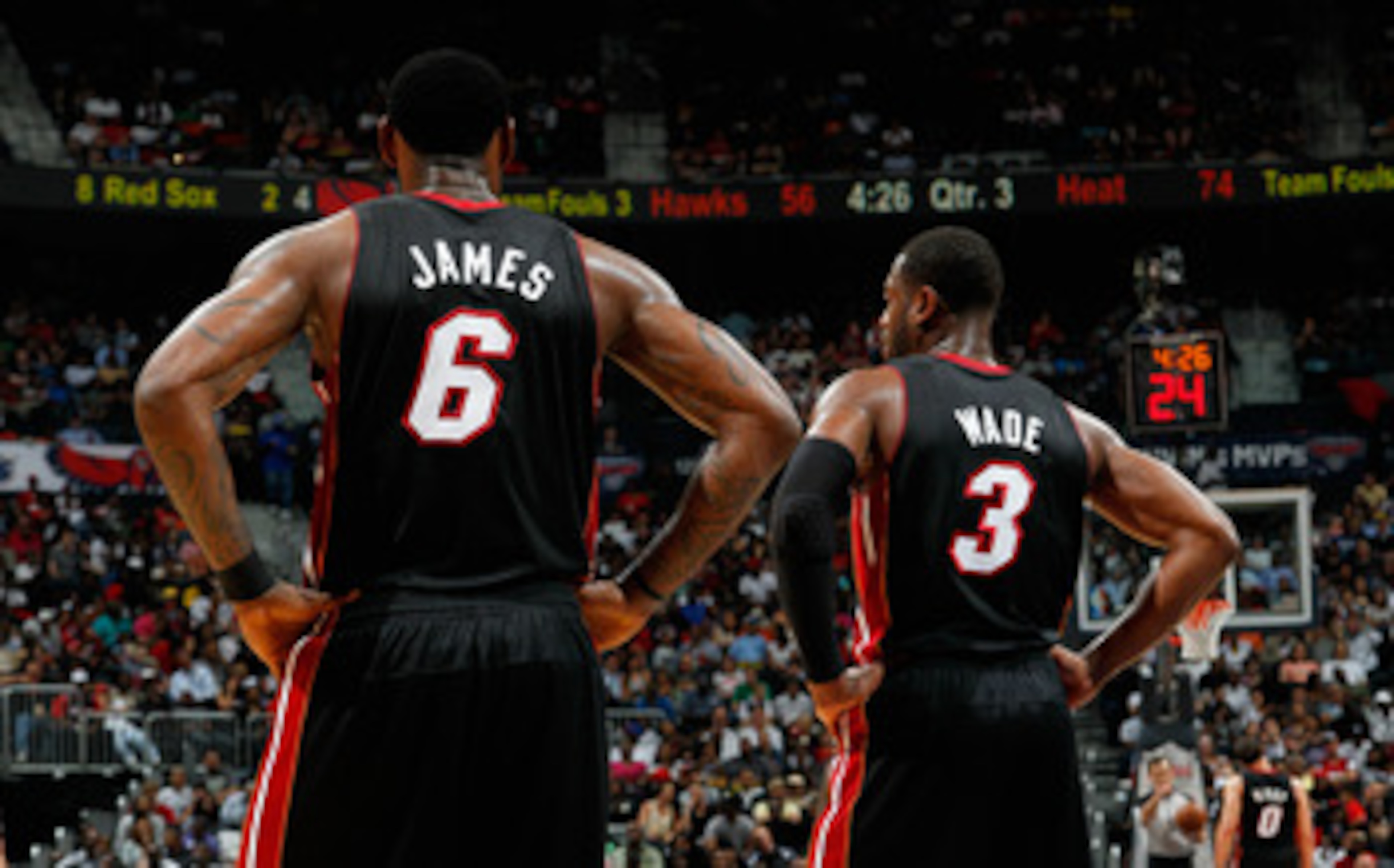 ATLANTA, GA - APRIL 11: LeBron James #6 and Dwyane Wade #3 of the Miami Heat stand during a free throw against the Atlanta Hawks at Philips Arena on April 11, 2011 in Atlanta, Georgia. NOTE TO USER: User expressly acknowledges and agrees that, by downlo ATLANTA, GA - APRIL 11: LeBron James #6 and Dwyane Wade #3 of the Miami Heat stand during a free throw against the Atlanta Hawks at Philips Arena on April 11, 2011 in Atlanta, Georgia. NOTE TO USER: User expressly acknowledges and agrees that, by downlo
