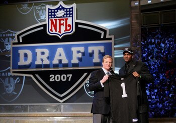 NEW YORK - APRIL 28:  JaMarcus Russell poses with NFL Commissioner Roger Goodell after being chosen first overall by the Oakland Raiders at the 2007 NFL Draft at Radio City Music Hall April 28, 2007 in New York City.  (Photo by Nick Laham/Getty Images)