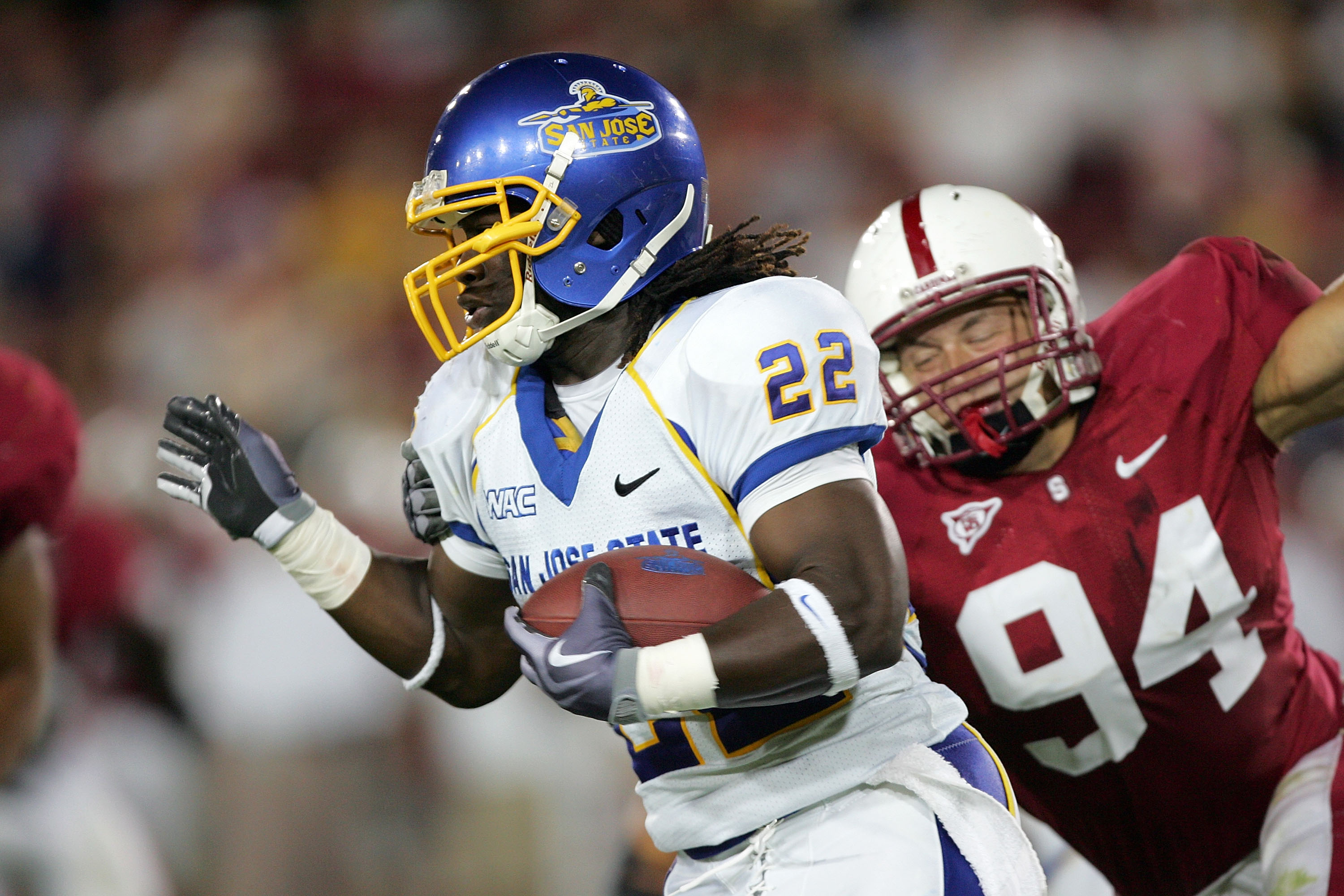 PALO ALTO, CA - SEPTEMBER 19:  Lamon Muldrow #22 of the San Jose State Spartans runs past Thomas Keiser #94 of the Stanford Cardinal at Stanford Stadium on September 19, 2009 in Palo Alto, California.  (Photo by Ezra Shaw/Getty Images)