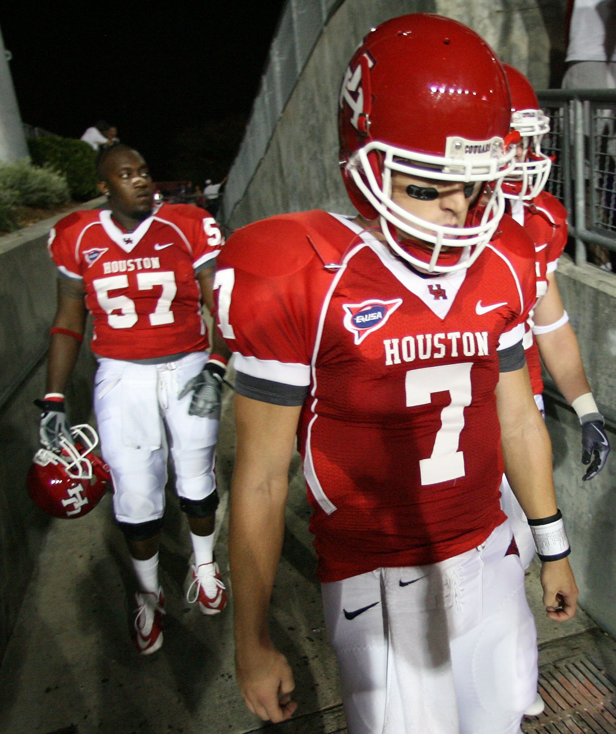 HOUSTON - SEPTEMBER 26:  Quarterback Case Keenum #7 of the Houston Cougars walks on the files before playing against the Texas Tech Red Raiders at Robertson Stadium on September 26, 2009 in Houston, Texas.  (Photo by Thomas B. Shea/Getty Images)