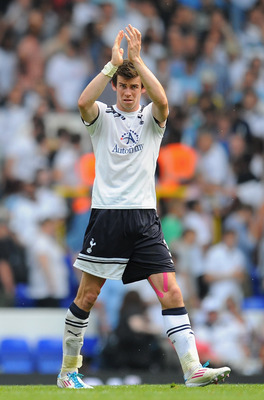 LONDON, ENGLAND - APRIL 23:  Gareth Bale of Spurs applauds the fans during the Barclays Premier League match between Tottenham Hotspur and West Bromwich Albion at White Hart Lane on April 23, 2011 in London, England.  (Photo by Mike Hewitt/Getty Images)
