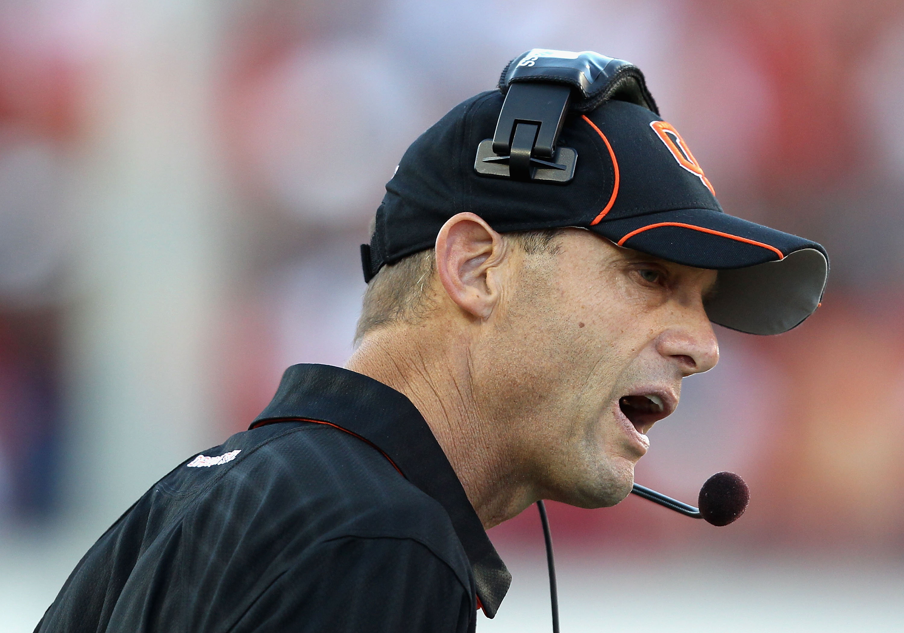 TUCSON, AZ - OCTOBER 09:  Head coach Mike Riley of the Oregon State Beavers talks with an official during the college football game against the Arizona Wildcats at Arizona Stadium on October 9, 2010 in Tucson, Arizona.  (Photo by Christian Petersen/Getty