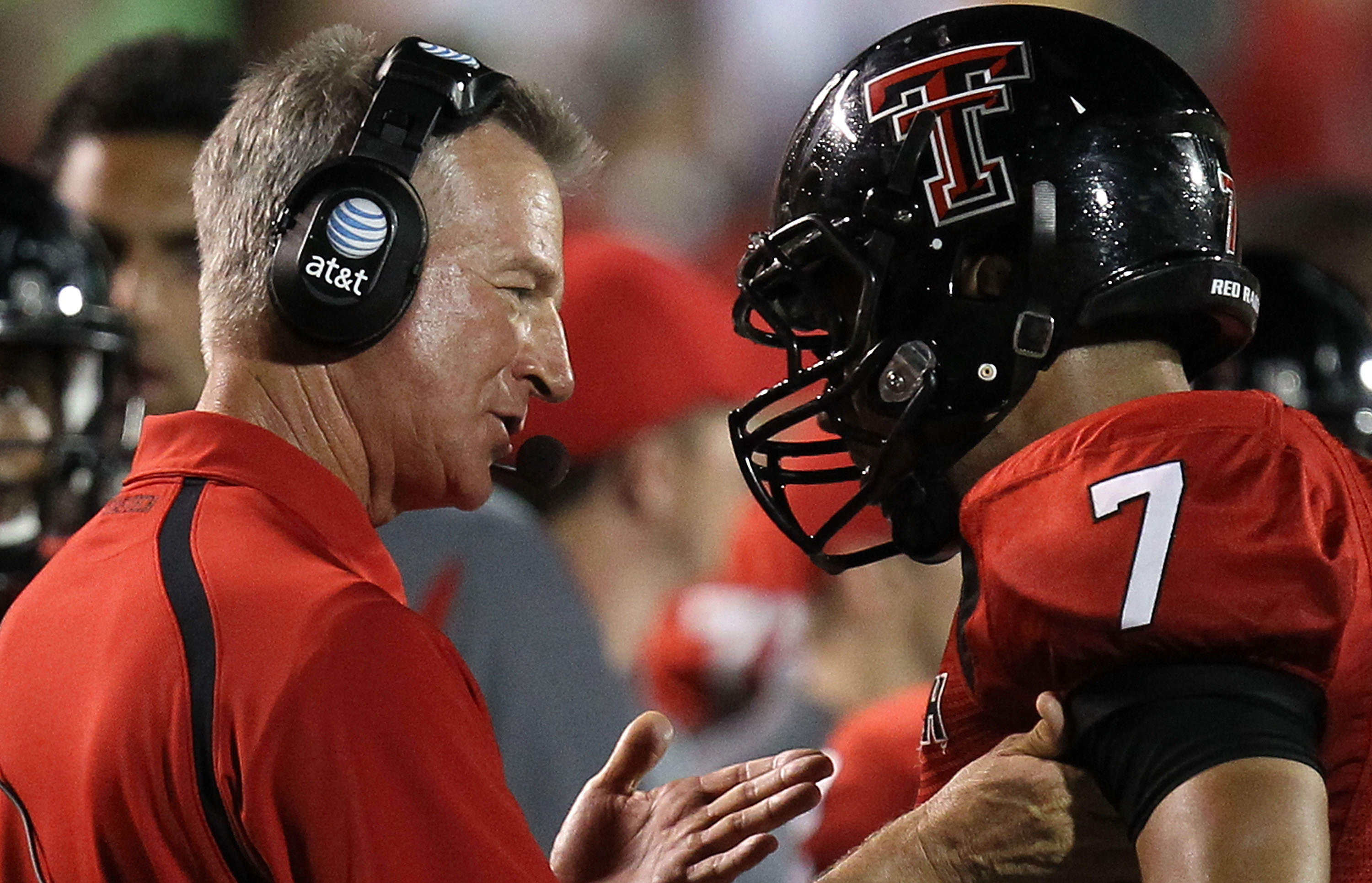 LUBBOCK, TX - SEPTEMBER 18:  Head coach Tommy Tuberville of the Texas Tech Red Raiders talks with Will Ford #7 during play against the Texas Longhorns at Jones AT&T Stadium on September 18, 2010 in Lubbock, Texas.  (Photo by Ronald Martinez/Getty Images)