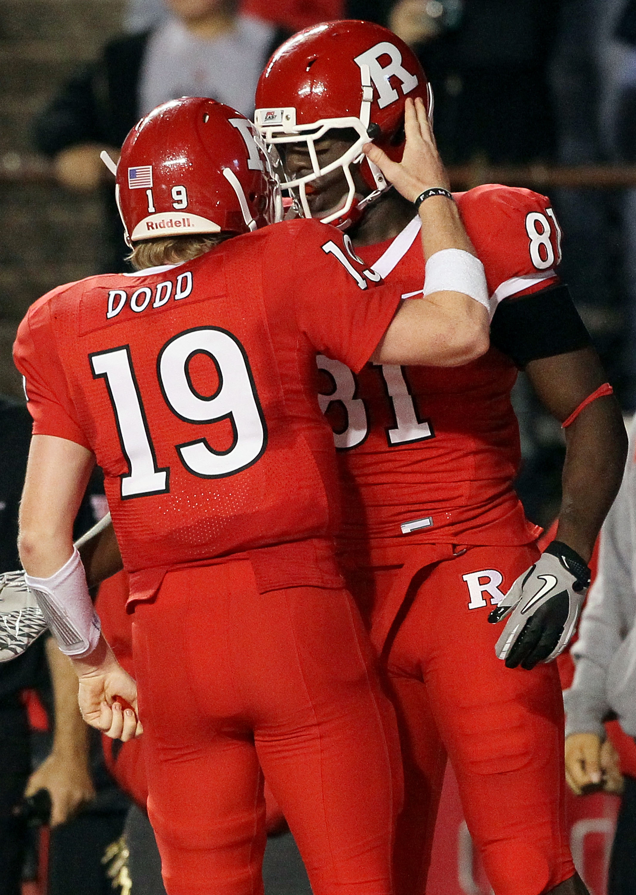 PISCATAWAY, NJ - OCTOBER 08:  Mark Harrison #81 of the Rutgers Scarlet Knights celebrates his game-tying touchdown against the Connecticut Huskies with teammate Chas Dodd #19 at Rutgers Stadium on October 8, 2010 in Piscataway, New Jersey. Rutgers defeate