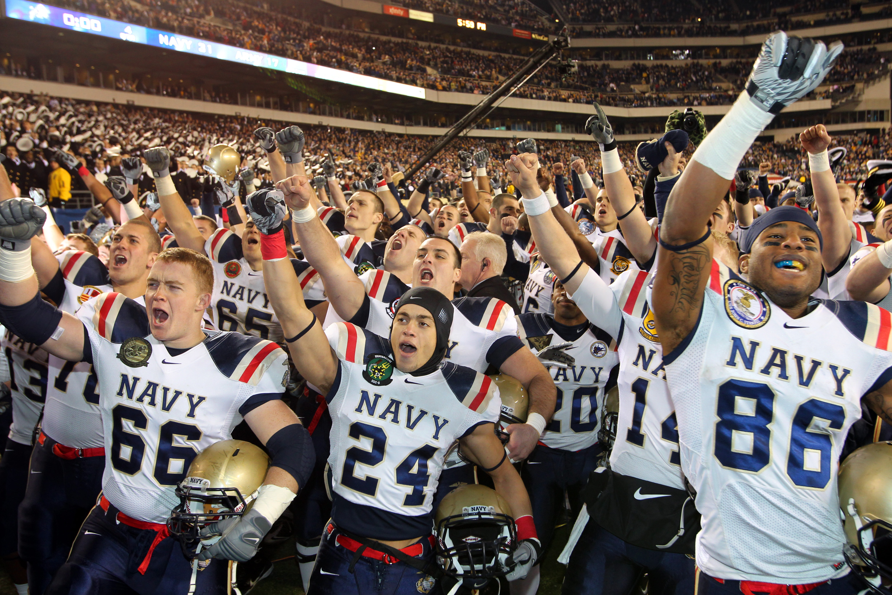 PHILADELPHIA - DECEMBER 11: The Navy Midshipmen celebrate their victory after a game against the Army Black Knights on December 11, 2010 at Lincoln Financial Field in Philadelphia, Pennsylvania. The Midshipmen won 31-17. (Photo by Hunter Martin/Getty Imag