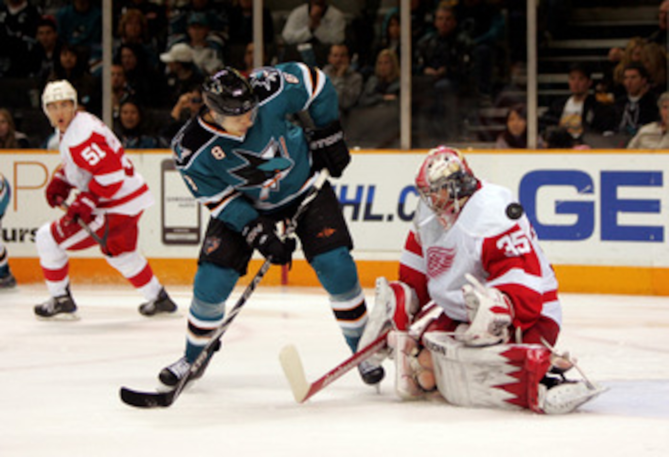SAN JOSE, CA - JANUARY 09: Jimmy Howard #35 of the Detroit Red Wings makes a save on a shot taken by Joe Pavelski #8 of the San Jose Sharks at HP Pavilion on January 9, 2010 in San Jose, California. (Photo by Ezra Shaw/Getty Images)