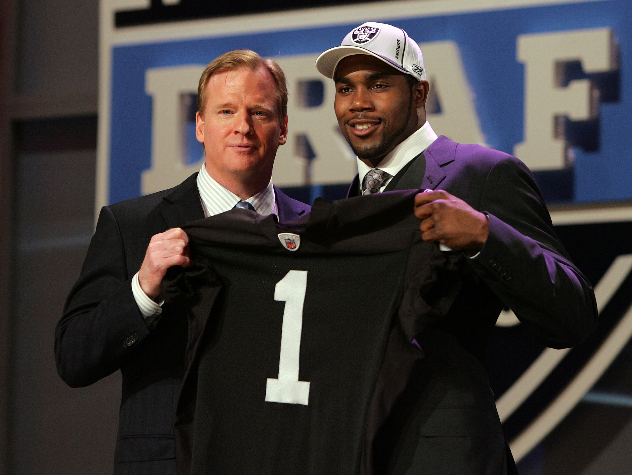 NEW YORK - APRIL 26: Darren McFadden poses for a photo after being selected fourth overall by the Oakland Raiders with National Football League Commissioner Roger Goodell during the 2008 NFL Draft on April 26, 2008 at Radio City Music Hall in New York Ci NEW YORK - APRIL 26: Darren McFadden poses for a photo after being selected fourth overall by the Oakland Raiders with National Football League Commissioner Roger Goodell during the 2008 NFL Draft on April 26, 2008 at Radio City Music Hall in New York Ci