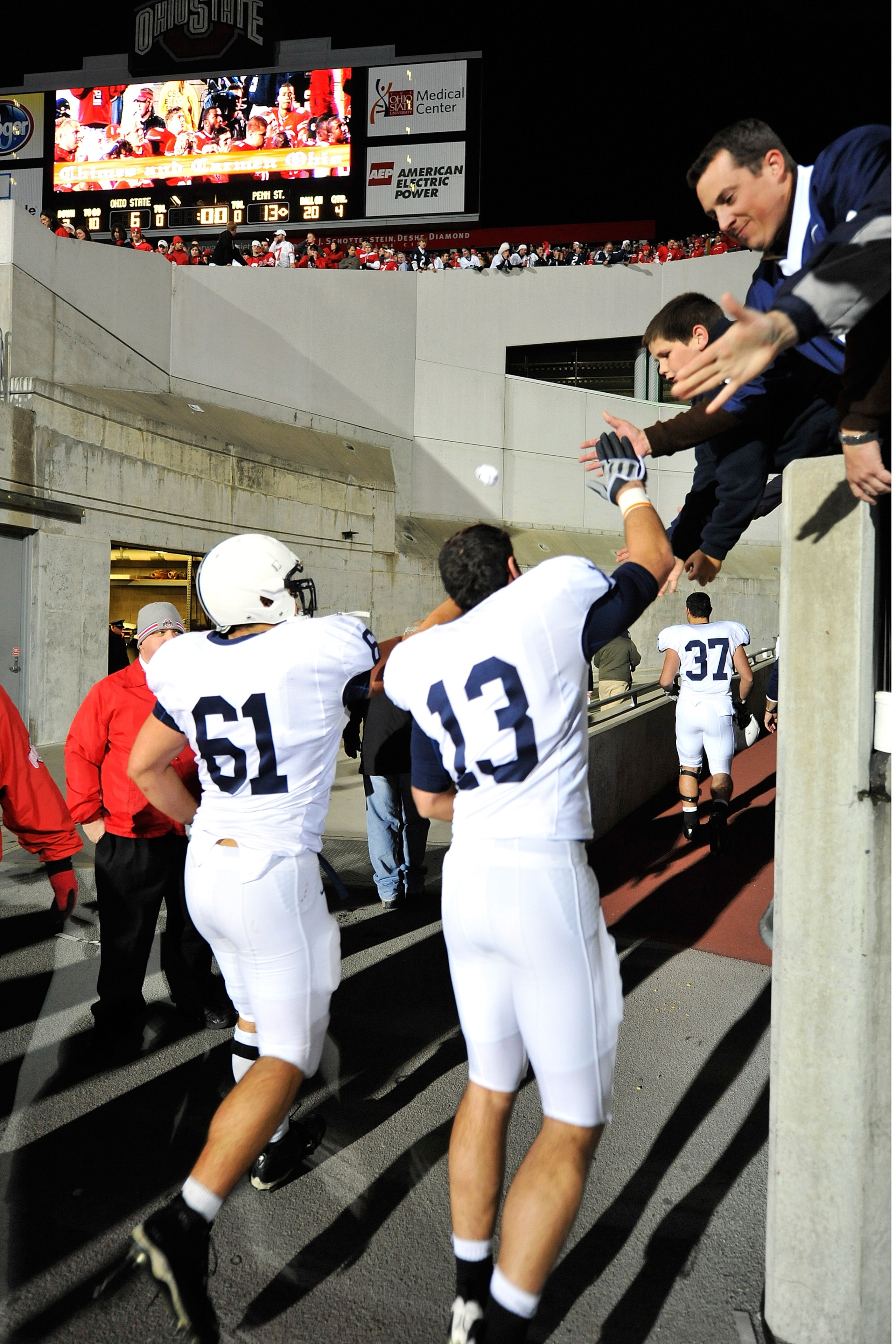 COLUMBUS, OH - OCTOBER 25: Stefen Wisniewski #61 and Andrew Dailey #13 of the Penn State Nittany Lions get congratulations from fans as they head to the locker room after defeating the Ohio State Buckeyes 13-6 on October 25, 2008 at Ohio Stadium in Columb COLUMBUS, OH - OCTOBER 25: Stefen Wisniewski #61 and Andrew Dailey #13 of the Penn State Nittany Lions get congratulations from fans as they head to the locker room after defeating the Ohio State Buckeyes 13-6 on October 25, 2008 at Ohio Stadium in Columb