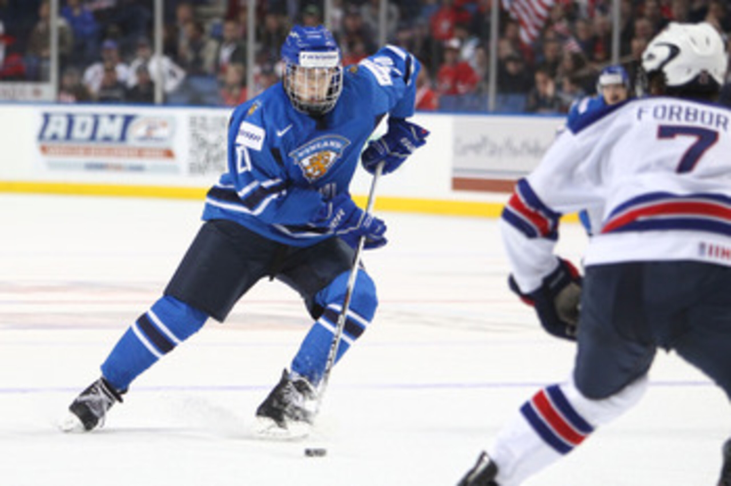 BUFFALO, NY - DECEMBER 26:  Joel Armia #20 of Finland carries the puck during the 2011 IIHF World U20 Championship Group A game between USA and Finland on December 26, 2010 at HSBC Arena in Buffalo, New York. (Photo by Tom Szczerbowski/Getty Images)