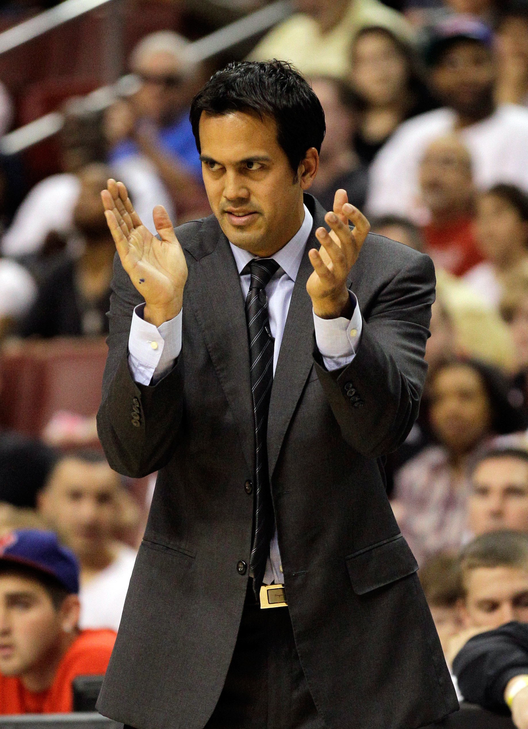 PHILADELPHIA, PA - APRIL 24: Head coach Erik Spoelstra of the Miami Heat applauds his team in Game Four of the Eastern Conference Quarterfinals in the 2011 NBA Playoffs at Wells Fargo Center on April 24, 2011 in Philadelphia, Pennsylvania. NOTE TO USER: U