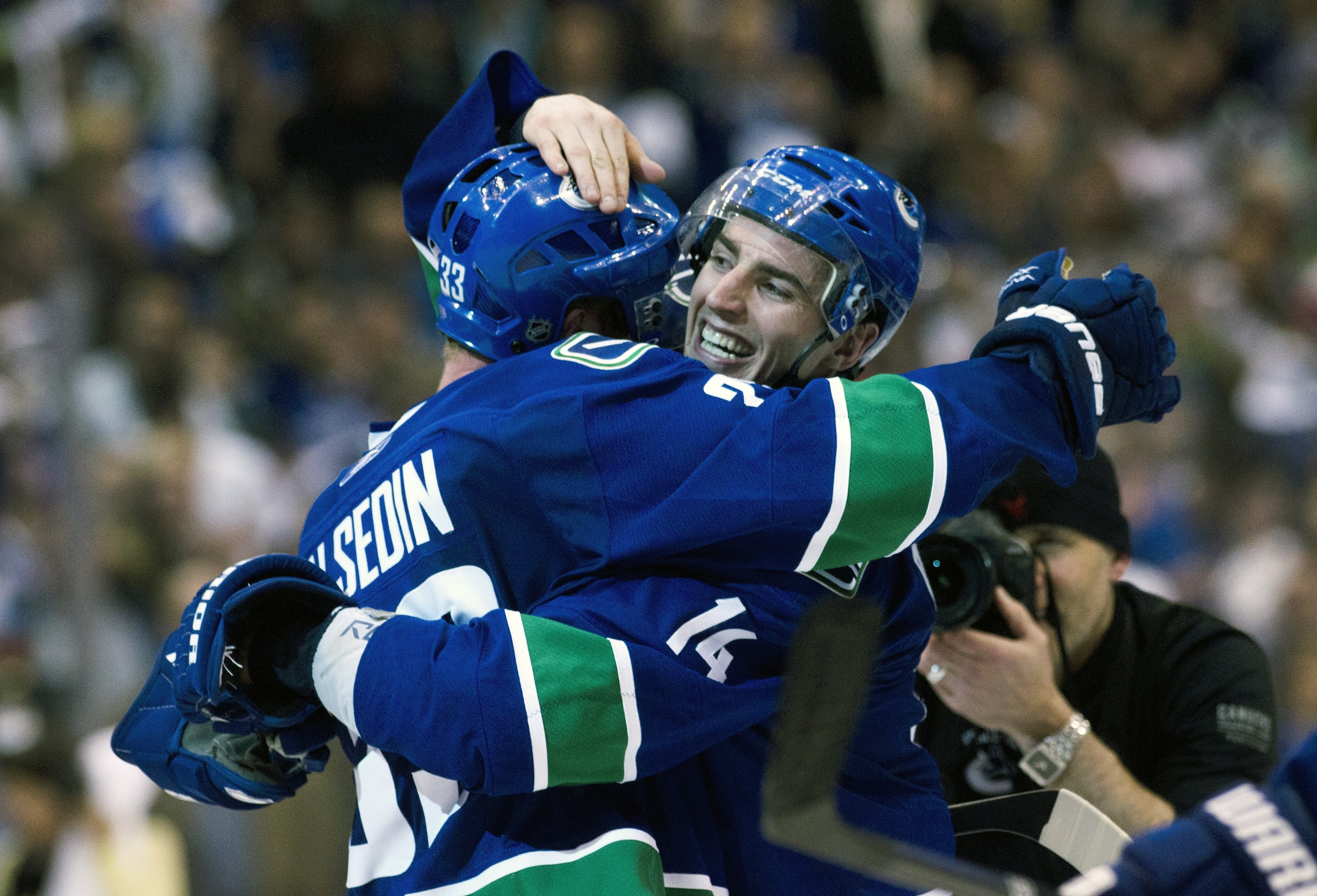 VANCOUVER, CANADA - APRIL 26: Alexandre Burrows #14 (right) of the Vancouver Canucks celebrates with Henrik Sedin #33 of the Vancouver Canucks after scoring the game winning goal against the Chicago Blackhawks during the overtime period in Game Seven of t VANCOUVER, CANADA - APRIL 26: Alexandre Burrows #14 (right) of the Vancouver Canucks celebrates with Henrik Sedin #33 of the Vancouver Canucks after scoring the game winning goal against the Chicago Blackhawks during the overtime period in Game Seven of t